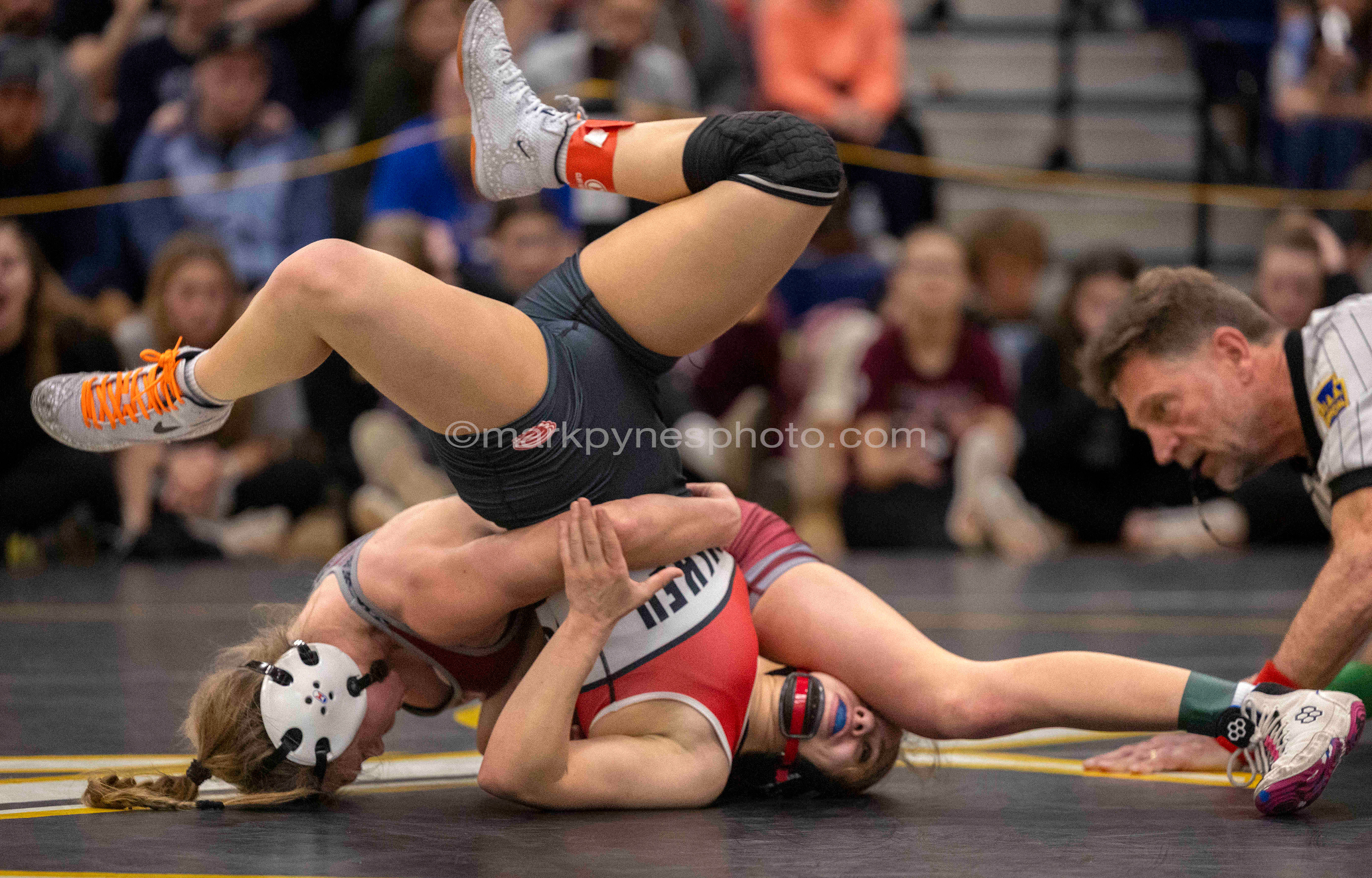 Olivia Kearns, Shippensburg, tips Journie Rodriguez, J.P. McCaskey, in the 112-pound final.