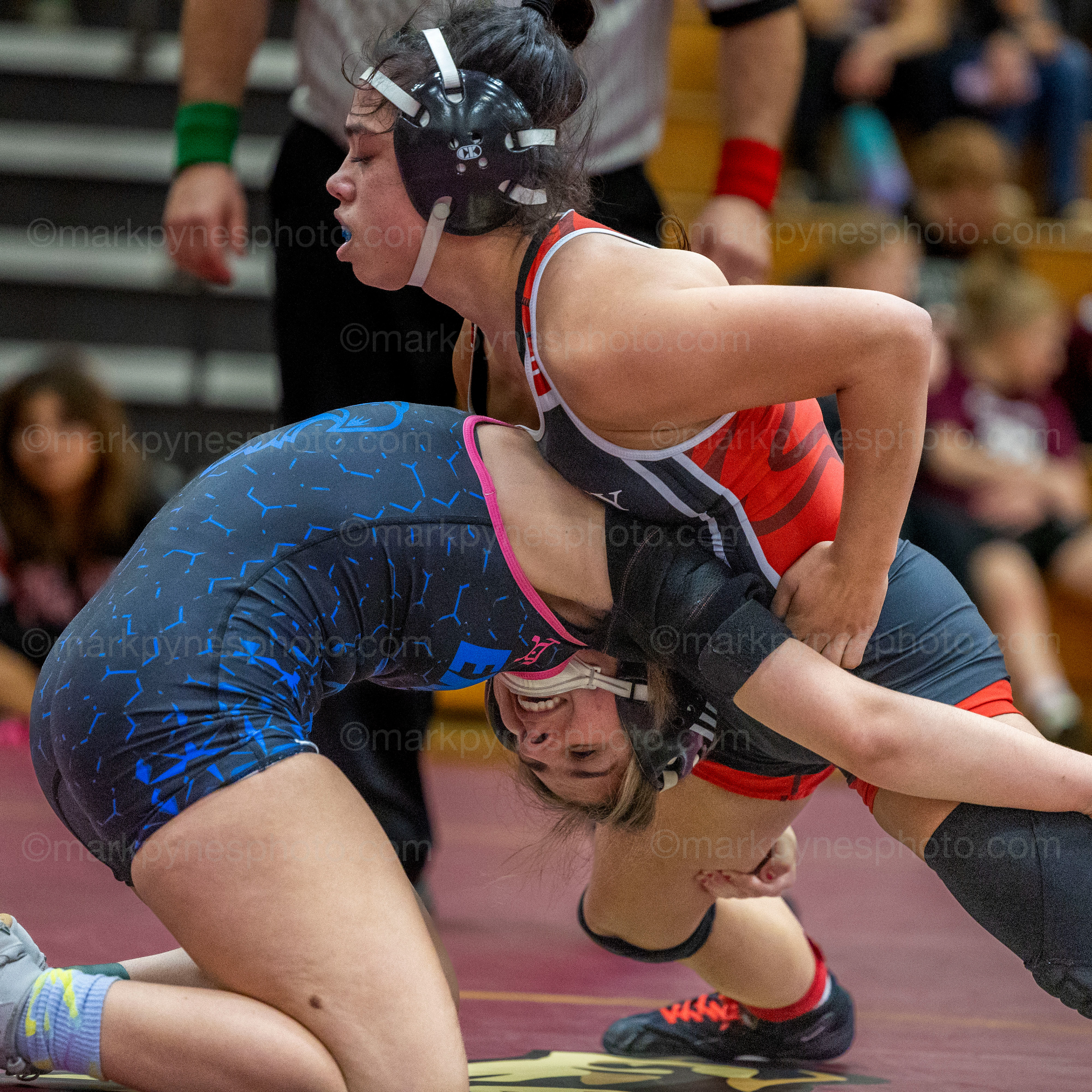 Kaleia Timko, J.P. McCaskey, right, sprawls on Exeter’s Liberty Furman, in the 136-pound final.