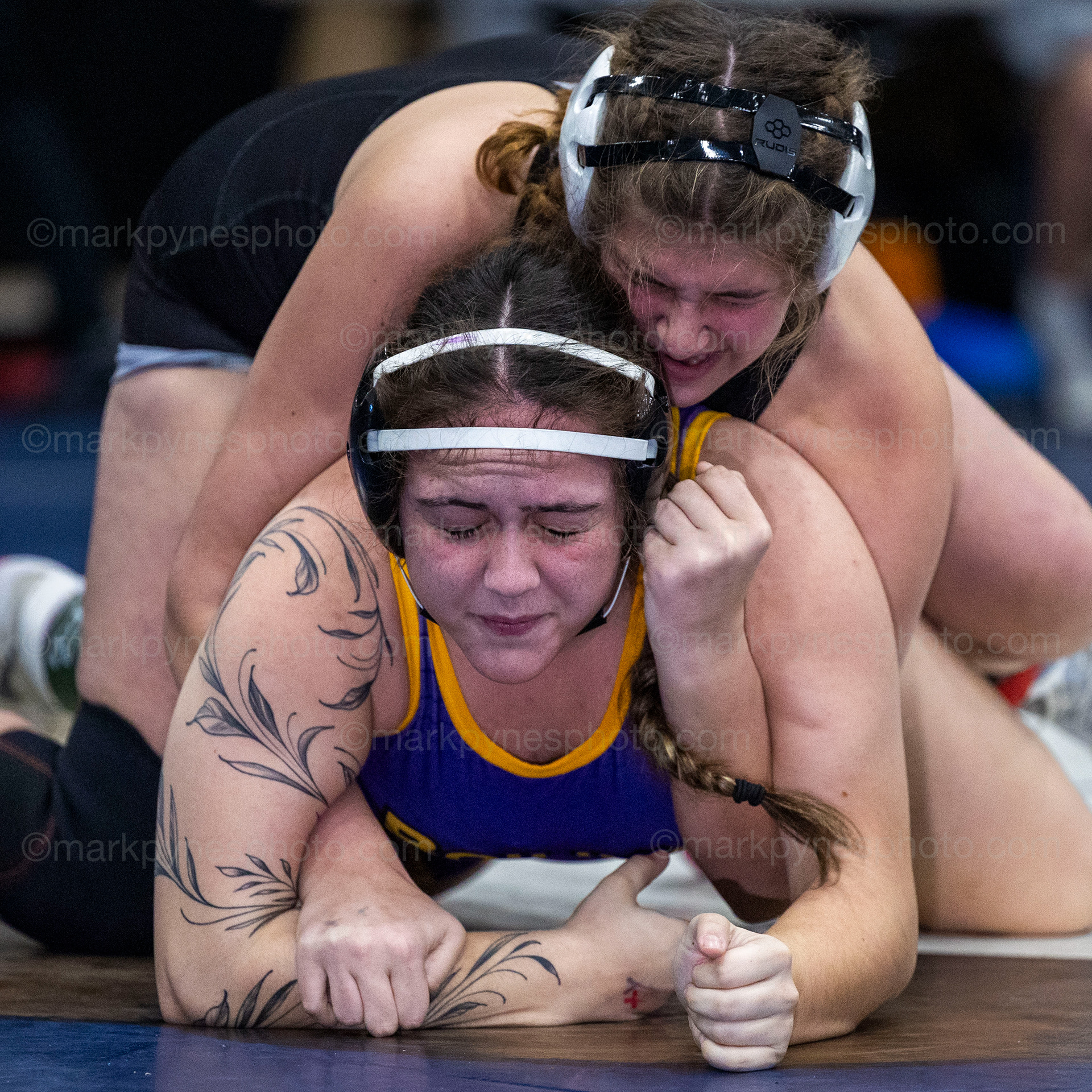 Chloe Ratcliffe, Upper Dauphin, rides Miley Rivera, Boiling Springs, a the way to a pin in the 190-pound final.
