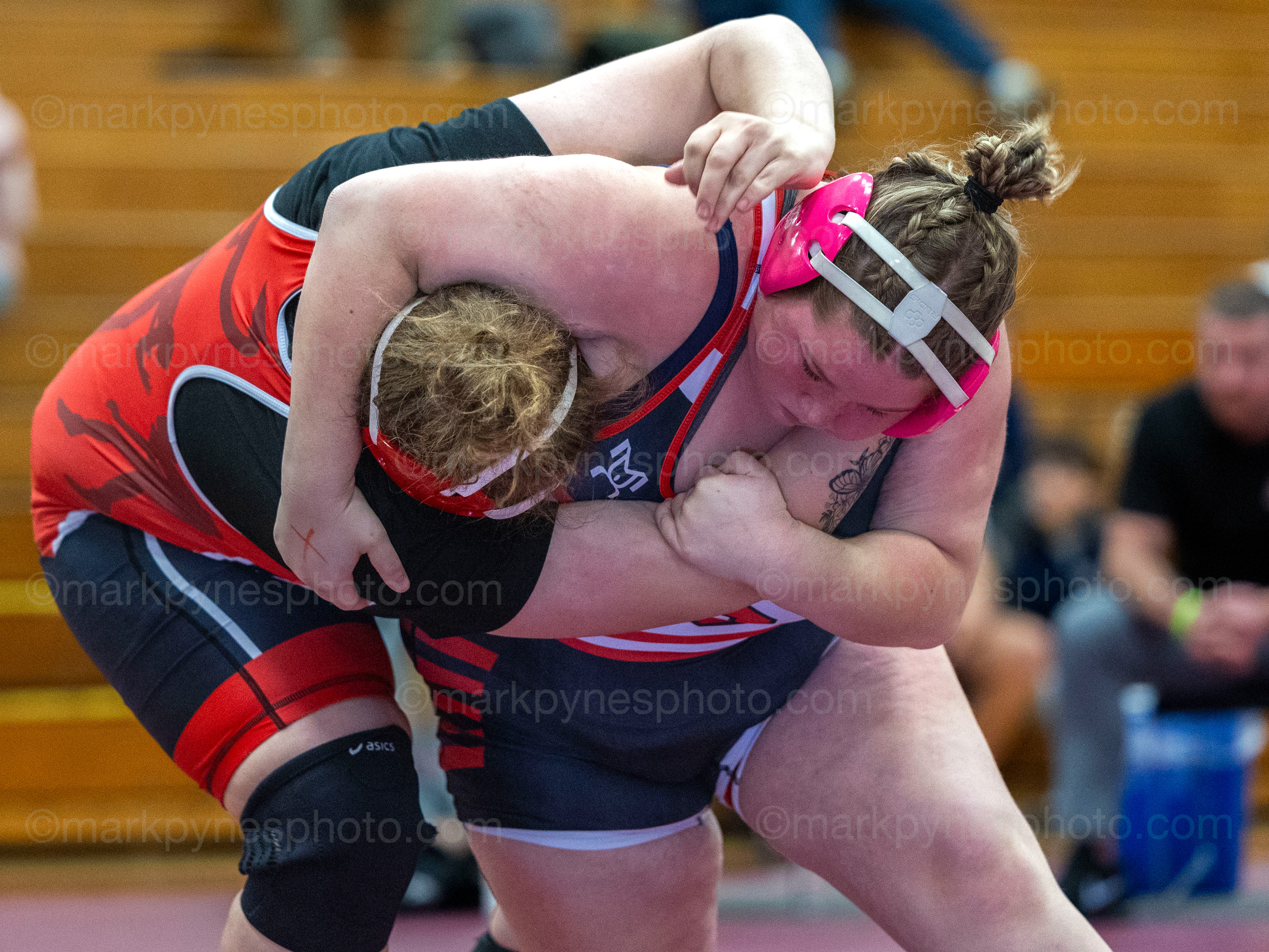 MacKenna Atkinson, Souderton, gets J.P. McCaskey’s Neveah Ramos in a headlock, on the way to a 16 second pin to win the 235-pound final.