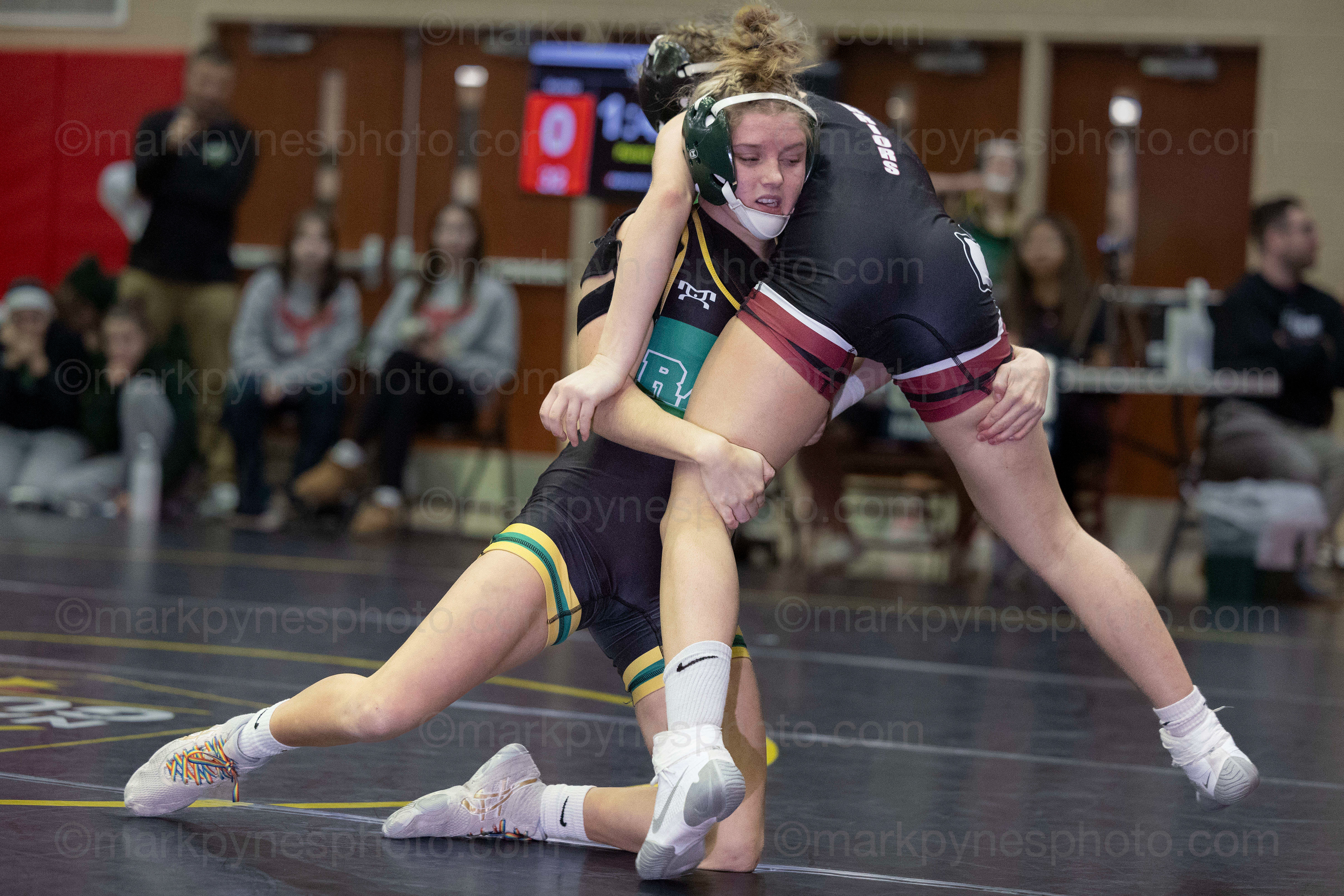 Kate Hollinger, Central Dauphin, lifts Gettysburg’s 106-pounder Taylor Keckler, on her way to an 8-7 decision.
