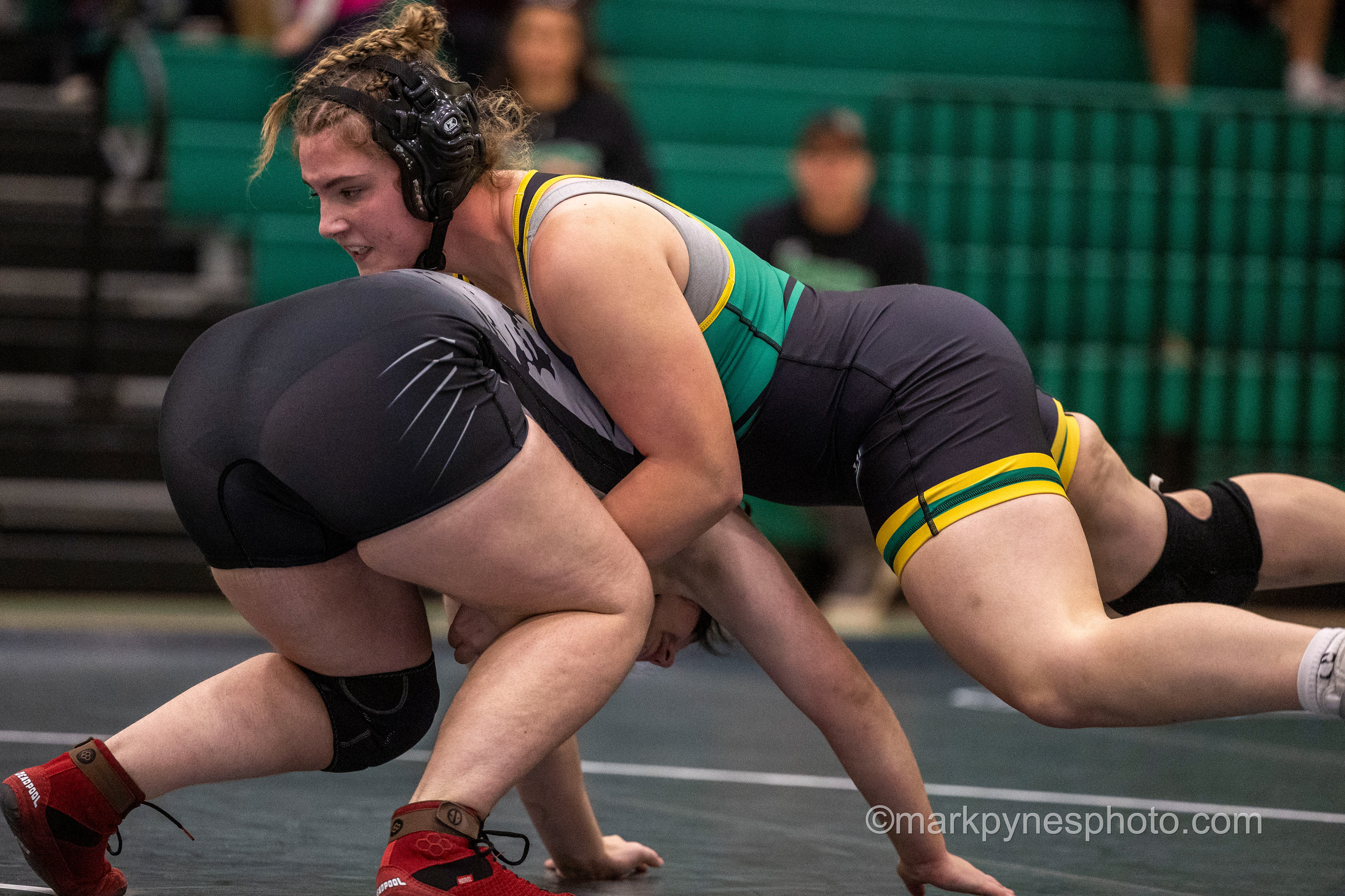 Rosie Reese, Central Dauphin, ties up Cumberland Valley’s Ronnie Guise, in their 190-pound match, won by Guise in a fall at 2:53.