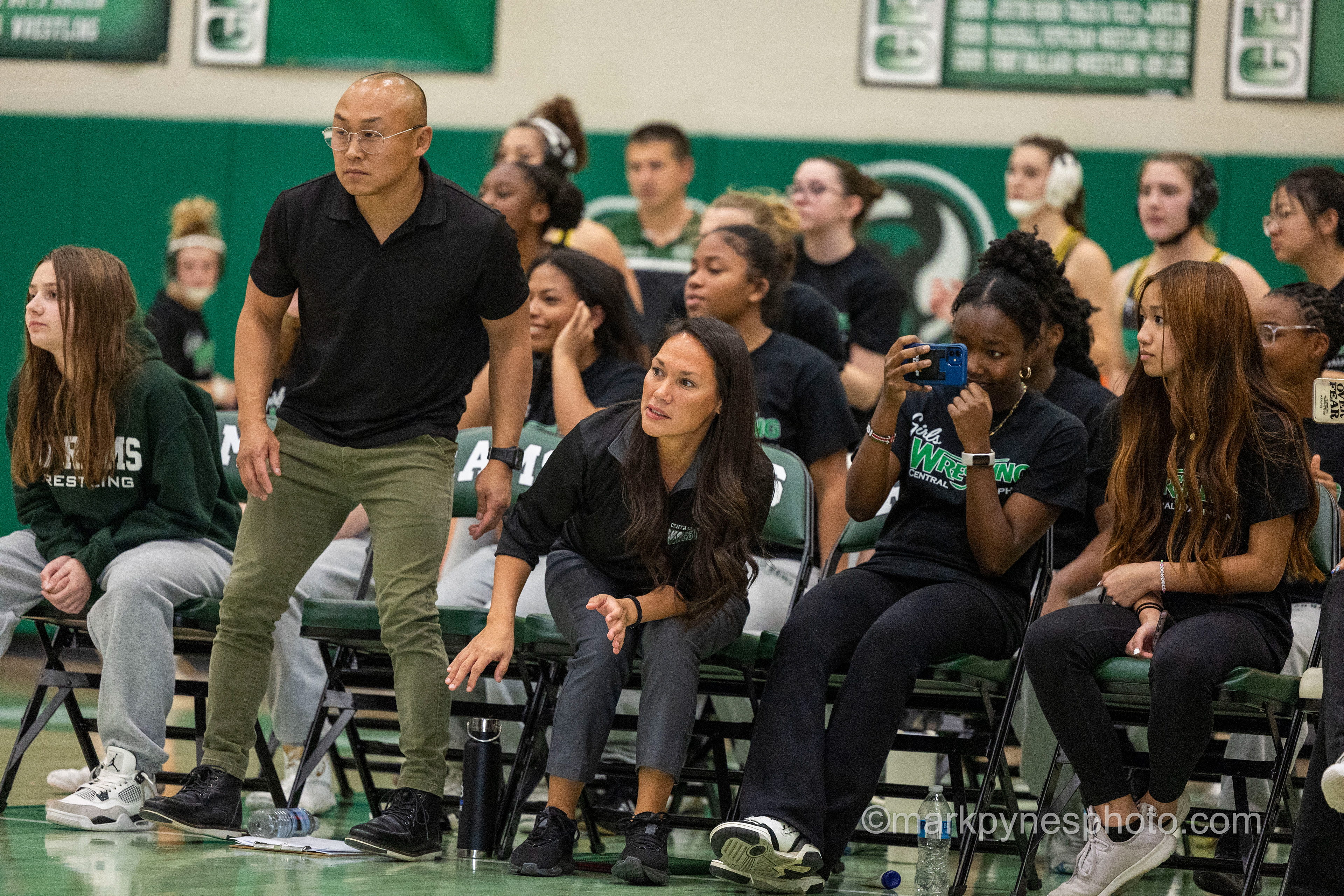 Central Dauphin head coach Jim Collins and his bench cheer on Victory Alleman but Cumberland Valley defeats Central Dauphin, 42-30, in girls wrestling dual meet action in Harrisburg, Pa., Dec. 10, 2024.