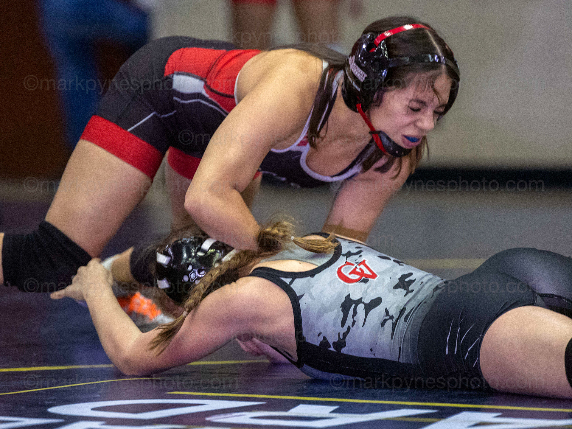 Journie Rodriguez, of J.P. McCaskey, snaps Cumberland Valley’s Kyleigh Smith, on her way to a 31-second pin at 112-pounds.