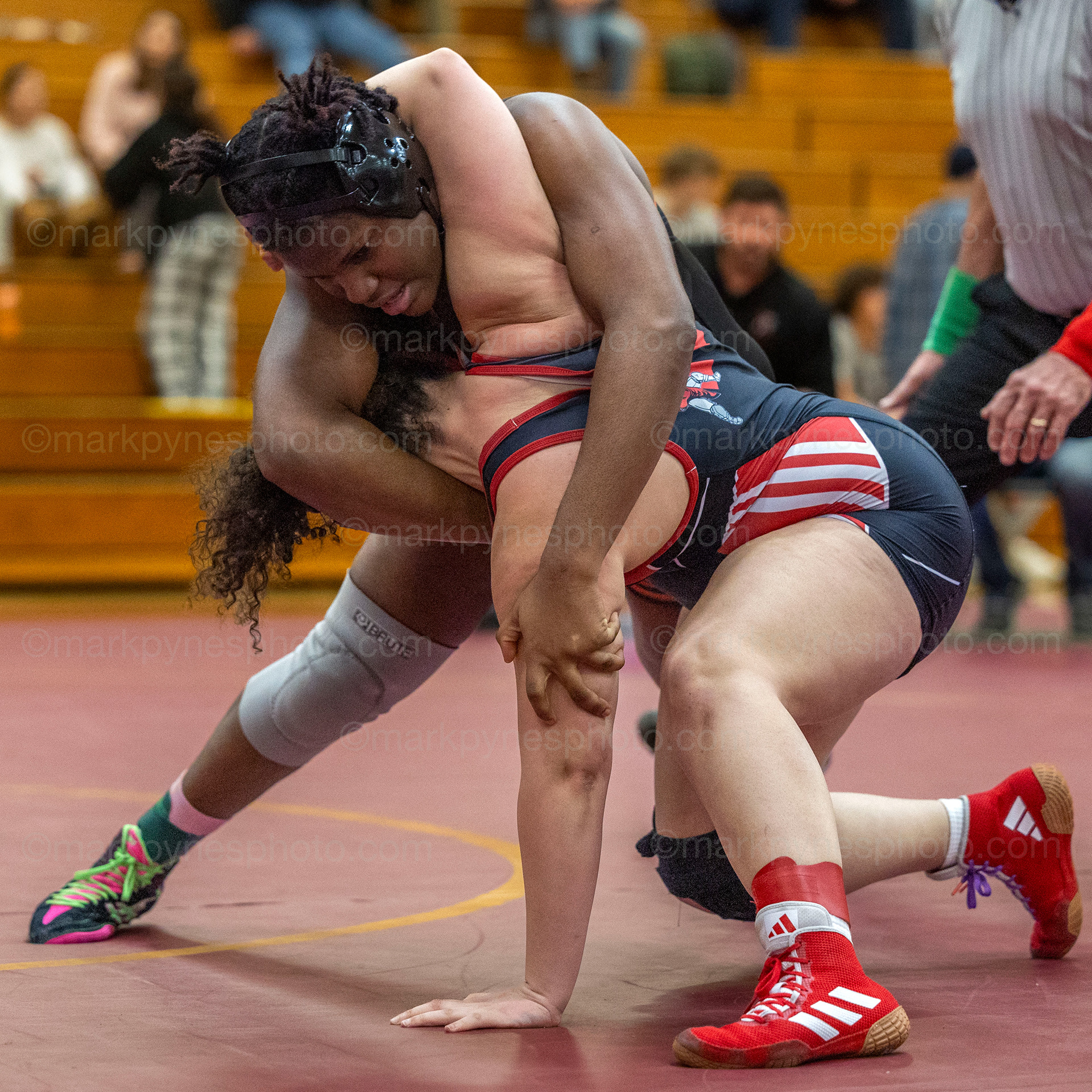 Angela Imorhoa, York Suburban, turns Reading’s Aneleyshka Rivera in the 170-pound final.