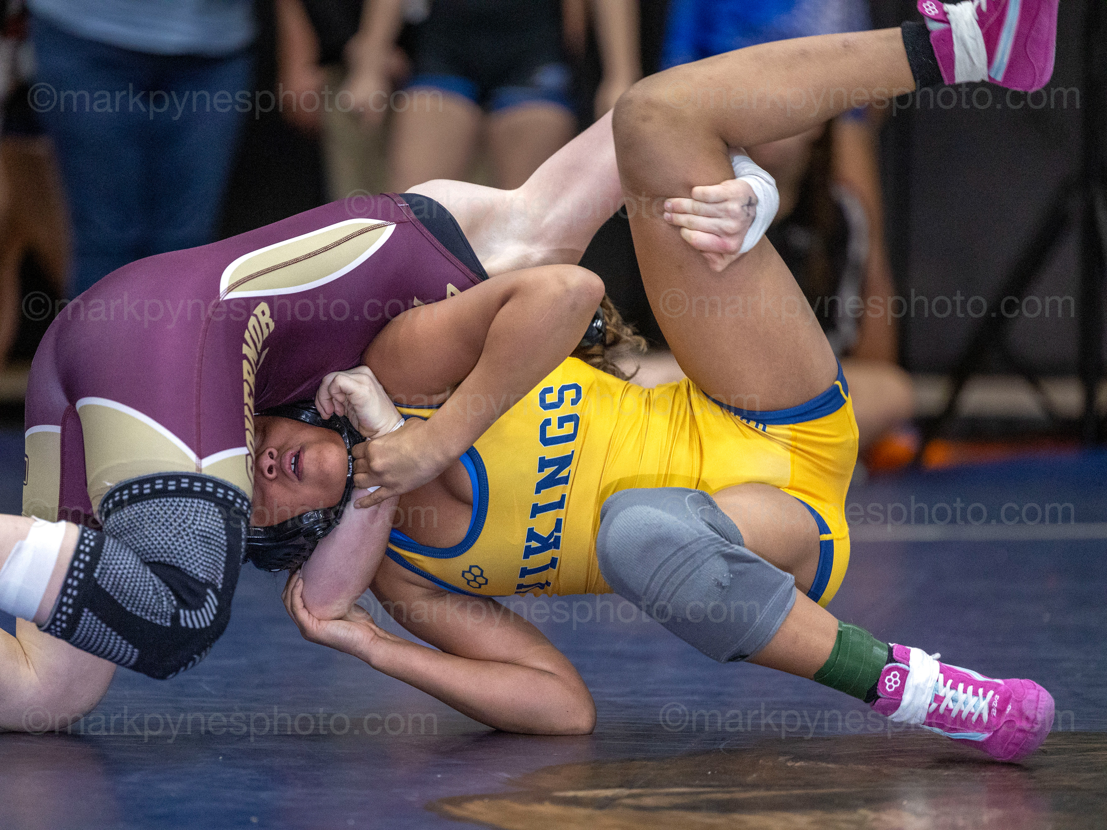 Emily Yerger, Governor Mifflin, throws, and later pins, Upper Merion’s Kyla Riley in the 118-pound final.