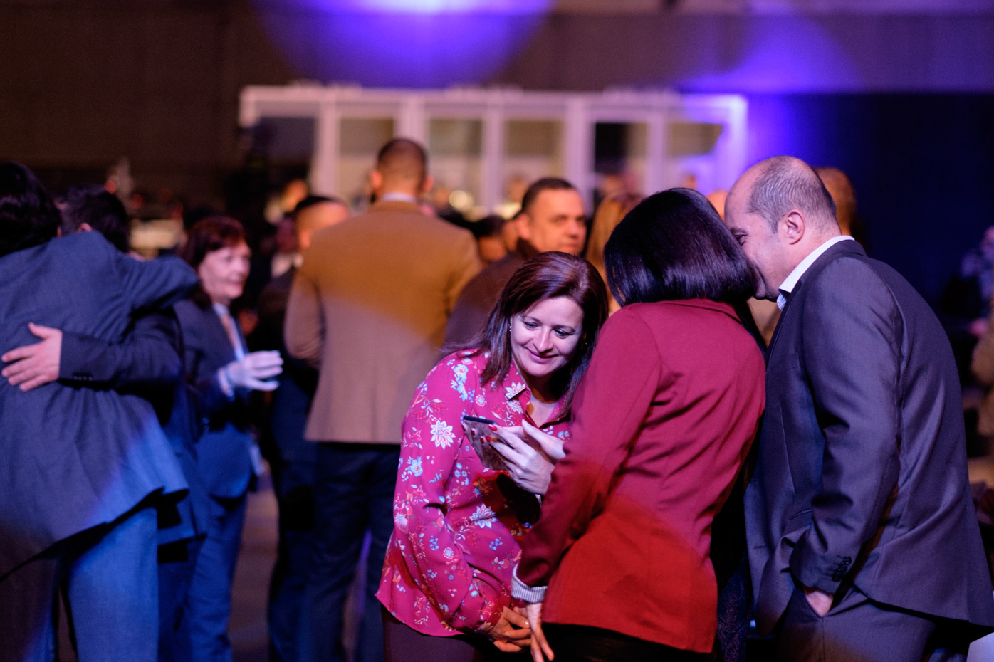 Candid photo of corporate event attendees