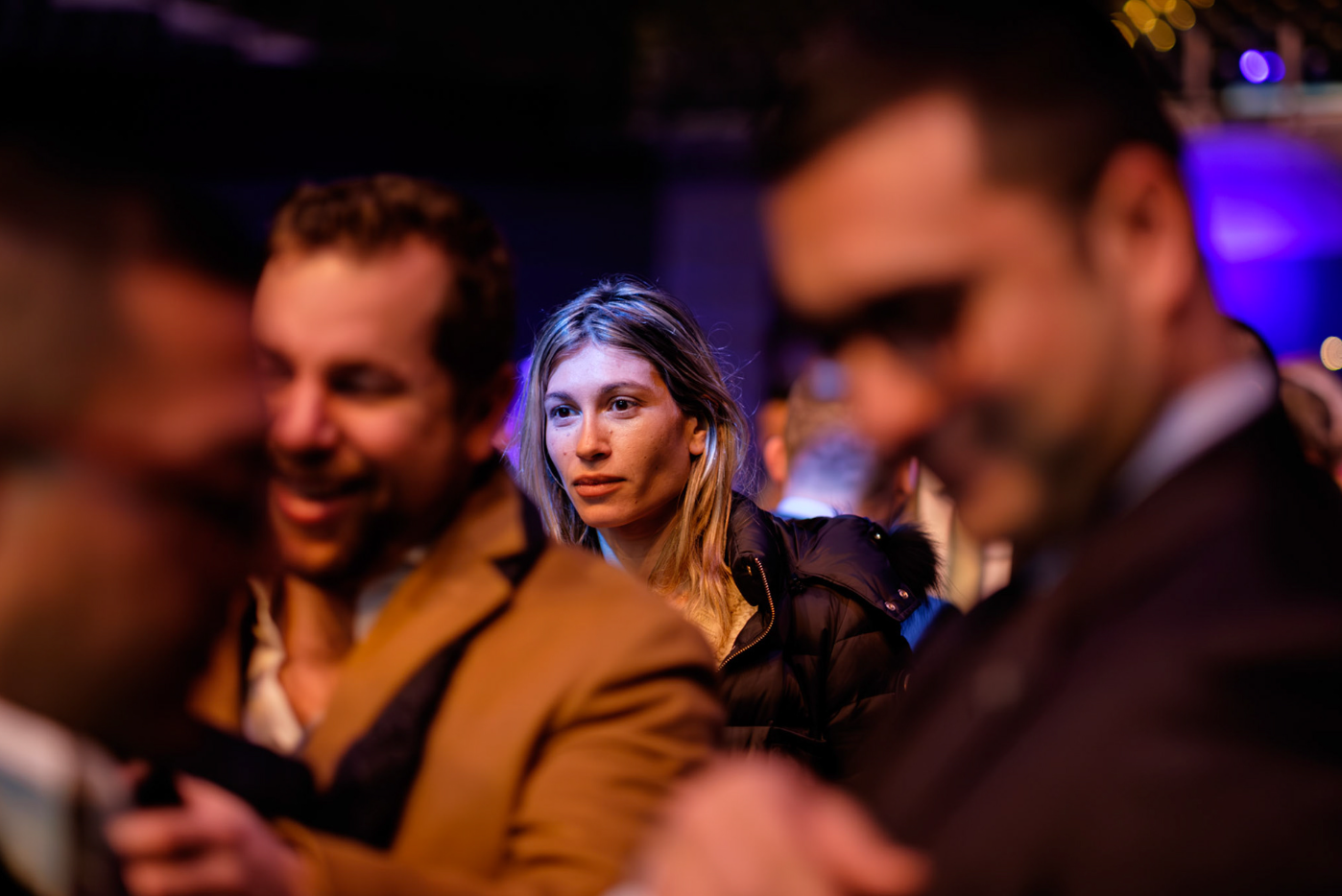 Candid photo of networking at corporate event