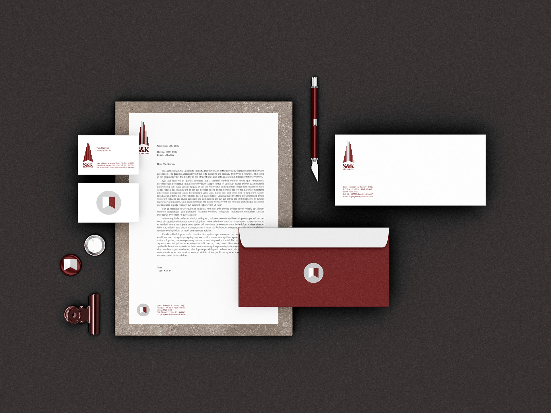 High-end minimalist stationery design for S&K Properties real estate brand, showing a geometric monogram bridging legacy and modernity.