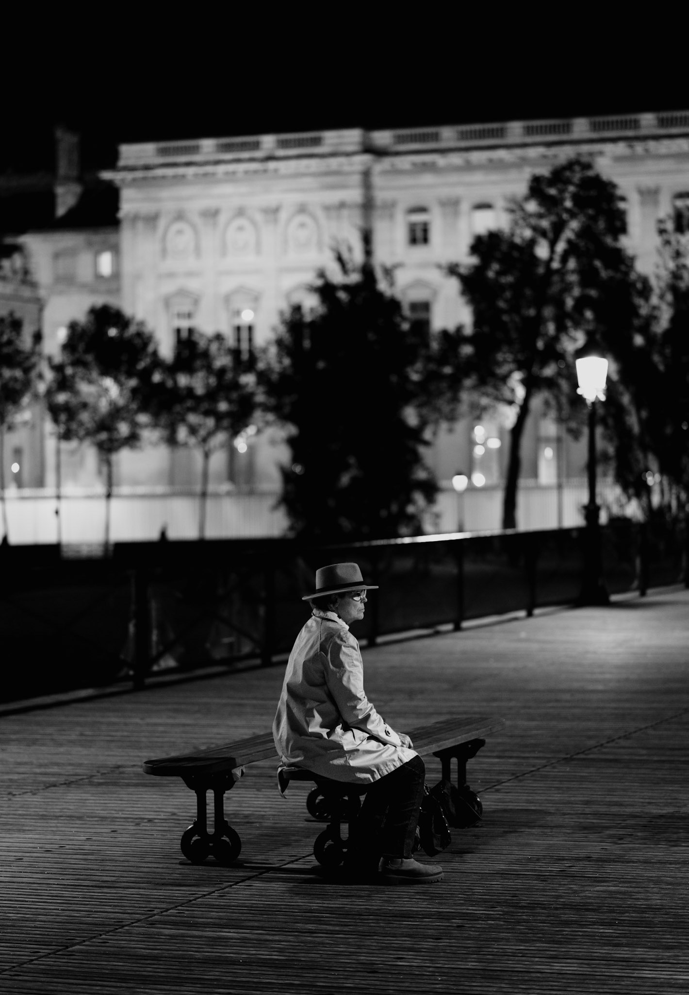 late at night on the pont des arts, i found this brief moment where the woman, who had just sat down, was entirely alone in the frame. though the bridge is usually full of life, the scene captured a feeling of total abandonment. it’s a reminder that even in the heart of a bustling city, there are moments of deep isolation.