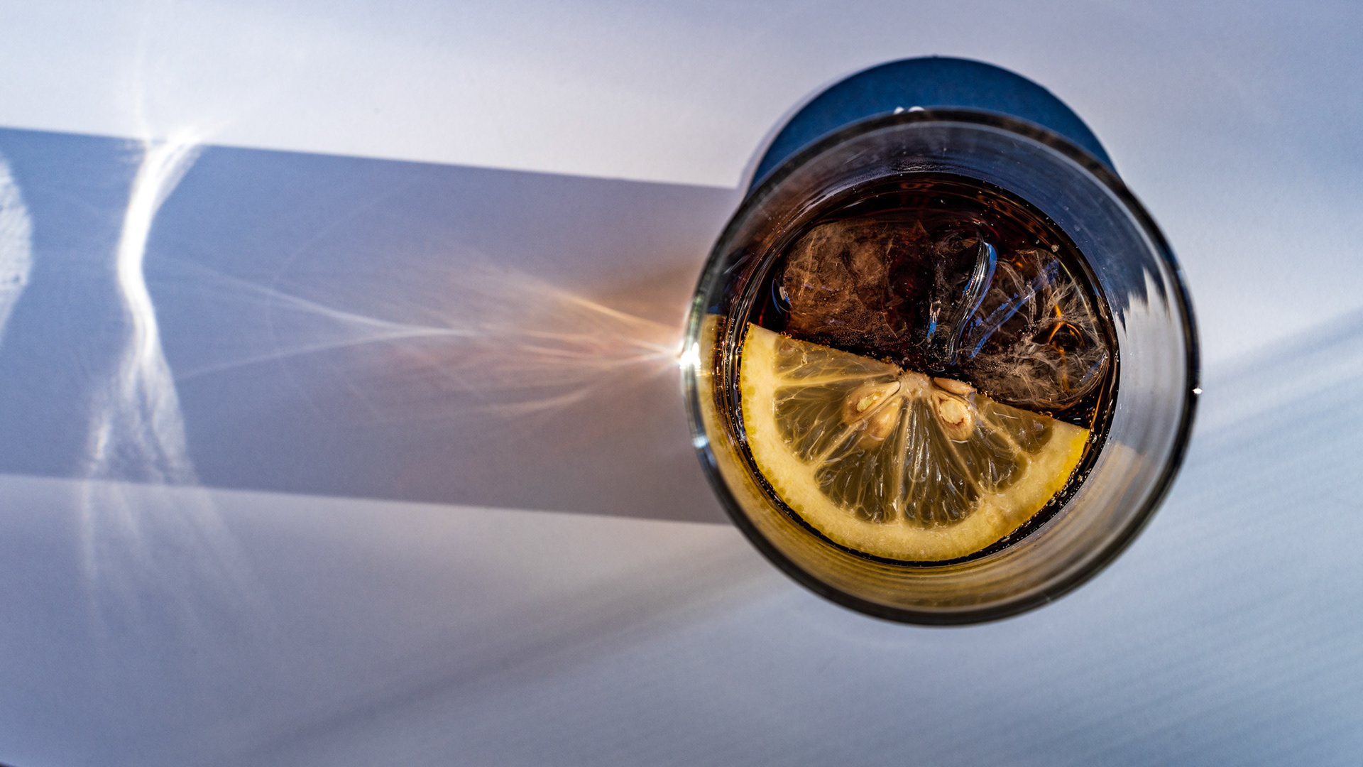 a cloudy day in palma. a bit of sun came through the clouds and the trees and illuminated the coke i was drinking beautifully.