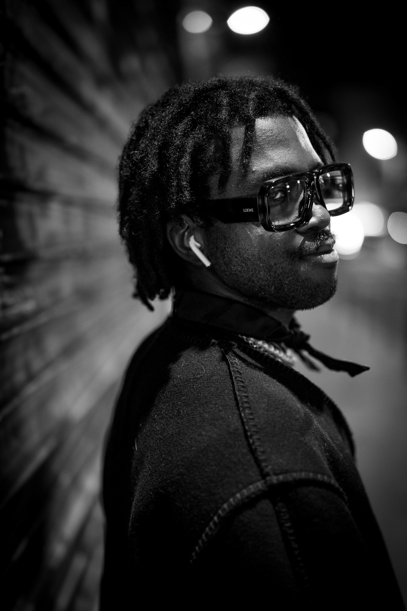 after a long photowalk through the vibrant streets of paris, as i was heading back to my hotel, i came across this young man and his dog. the soft streetlights illuminated his path, and something about his presence, his quiet confidence, compelled me to capture this portrait. it's always these unscripted encounters that leave a lasting mark. in this fleeting moment, i found a the balance between the shadows of the night and the glow of the city—a reflection of paris at its most intimate.