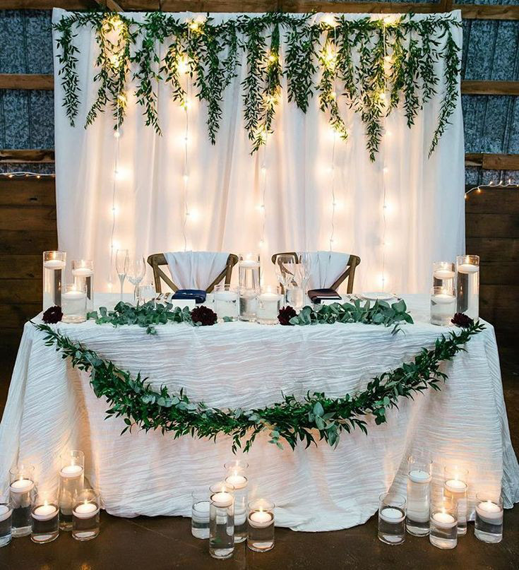 White Greenery Backdrop with Table Setup