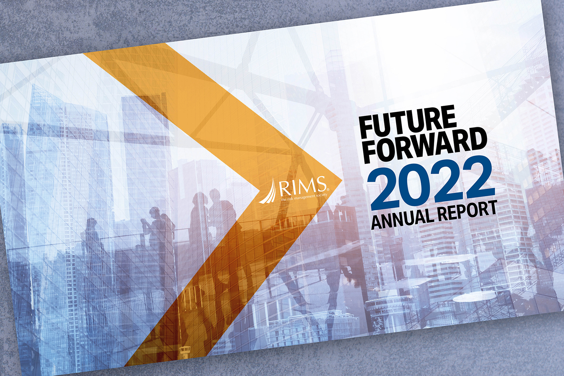 cover of RIMS annual report 2022 blue double exposure cover of businesspeople with gold right facing arrow with rims logo