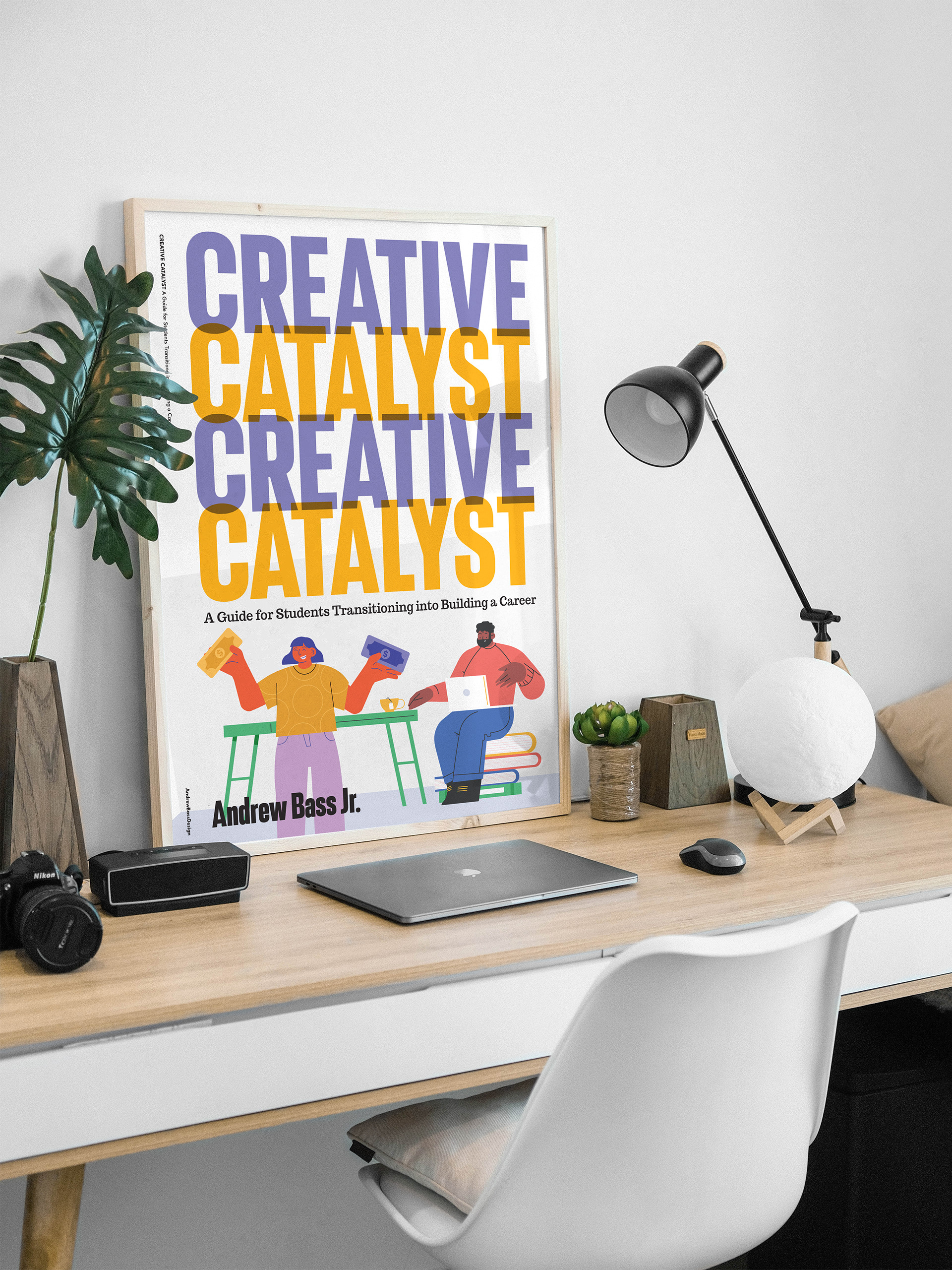 creative catalyst book cover in poster frame on studio desk