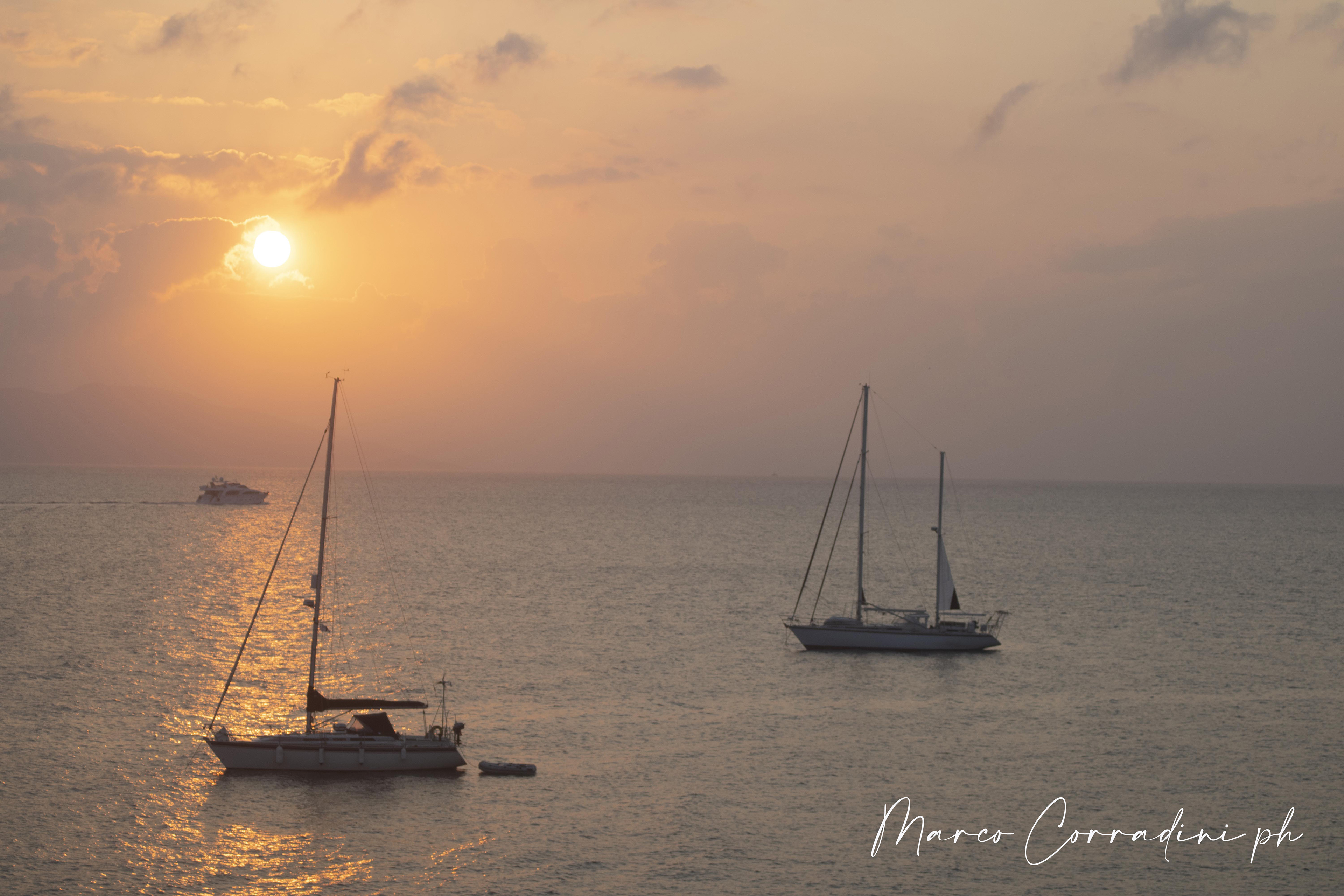 Kos sunrise over the sea with boats