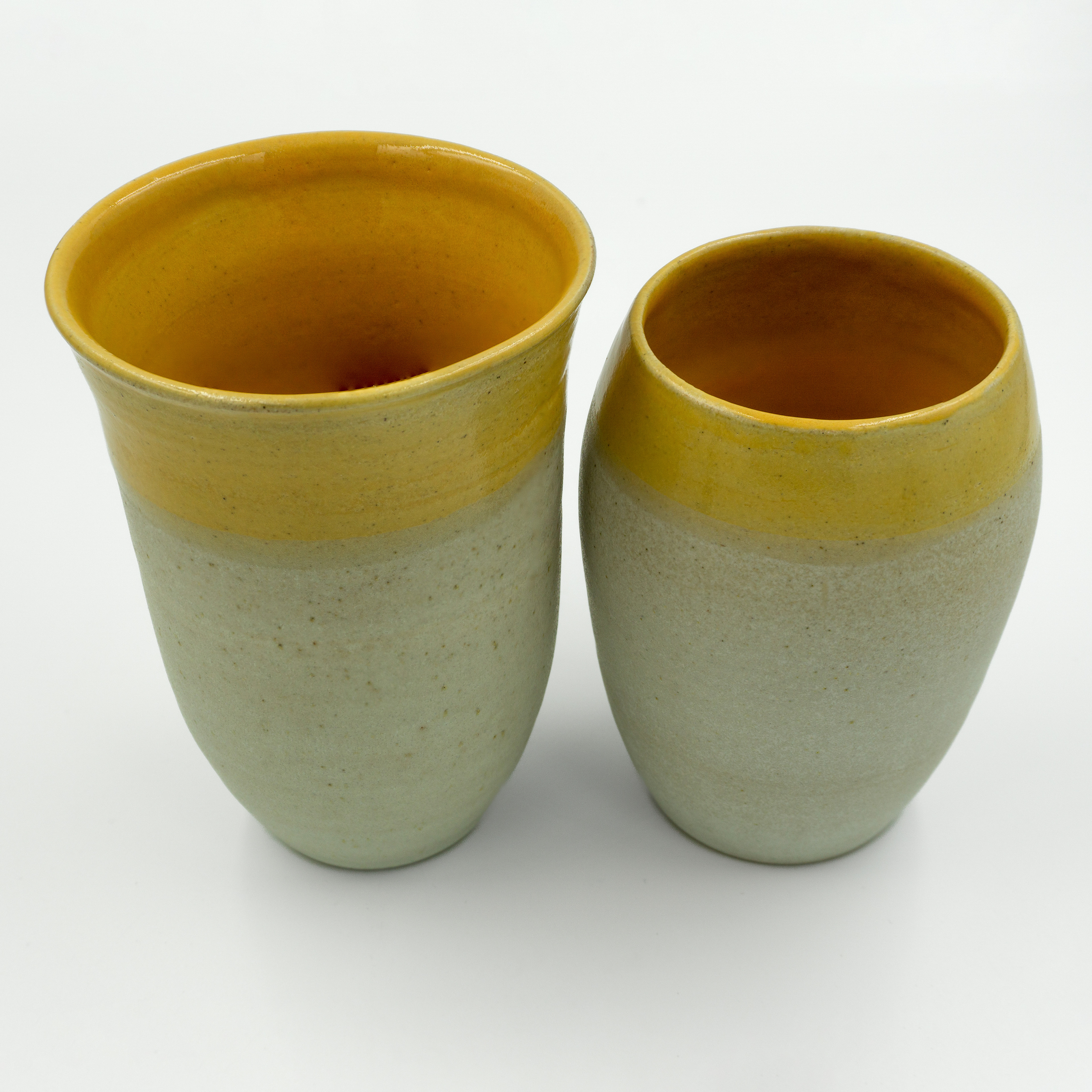 Two vases in shiny yellow and matt Dolomite glazes