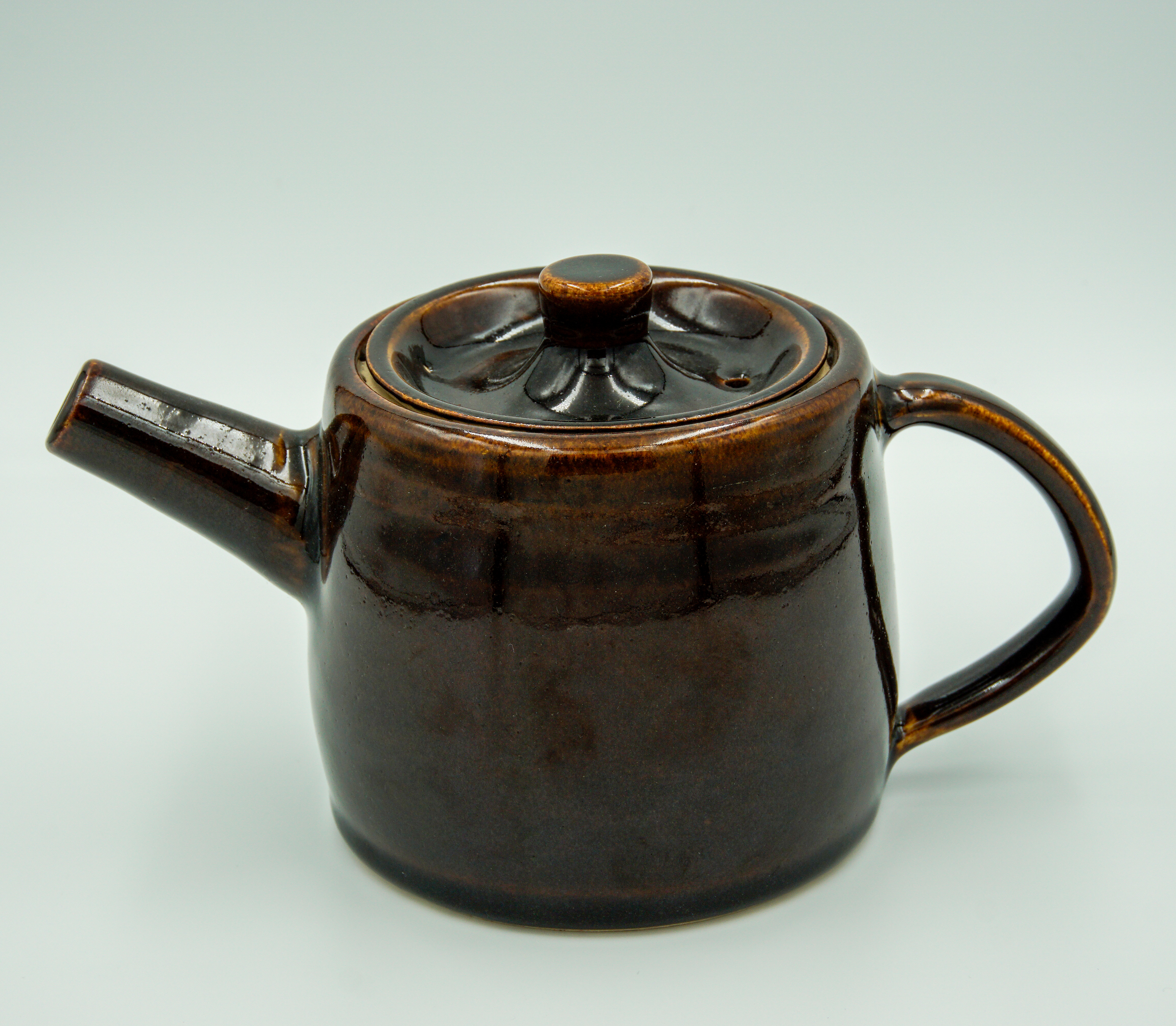 Traditional teapot in tenmoku glaze