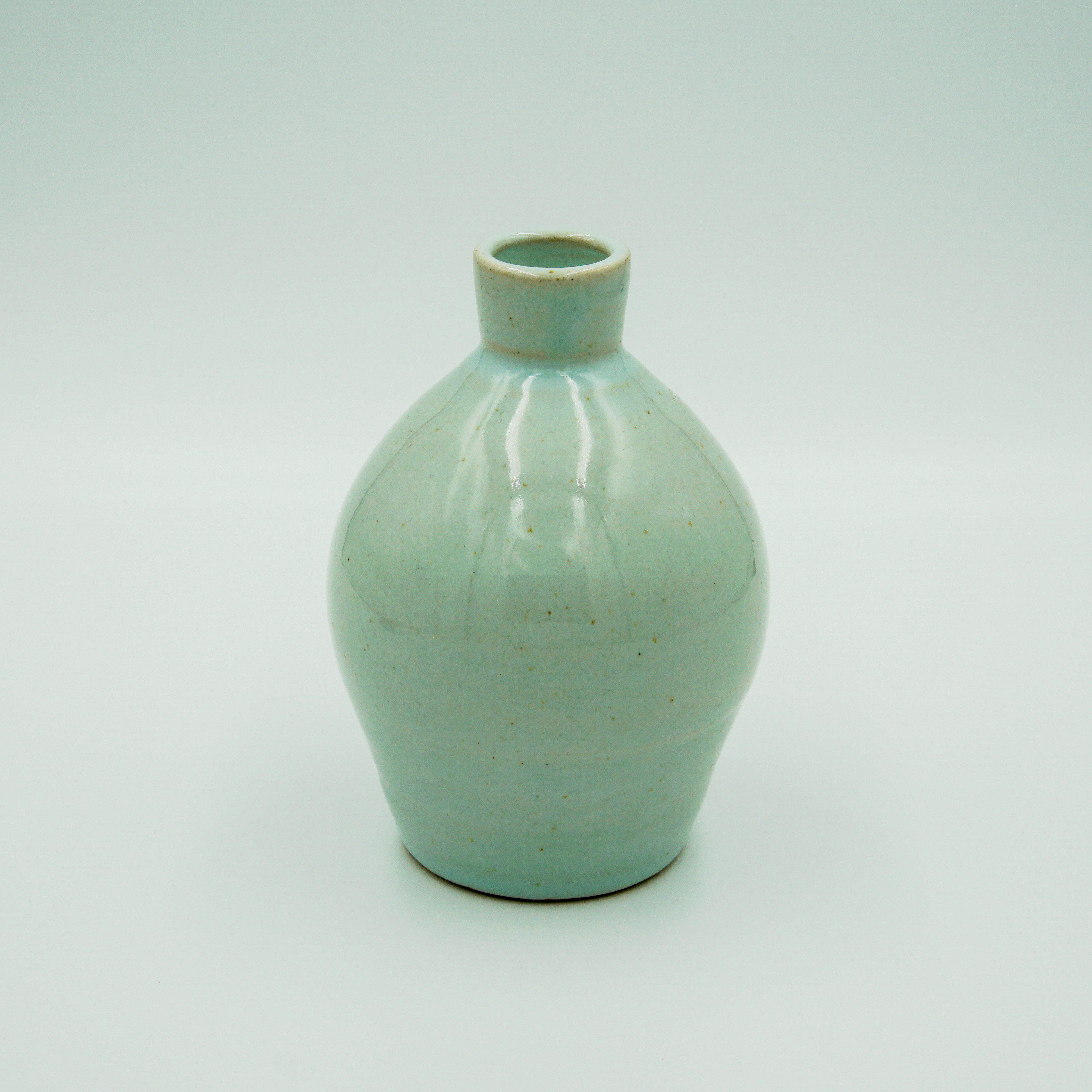 Small bud vase in turquoise glaze