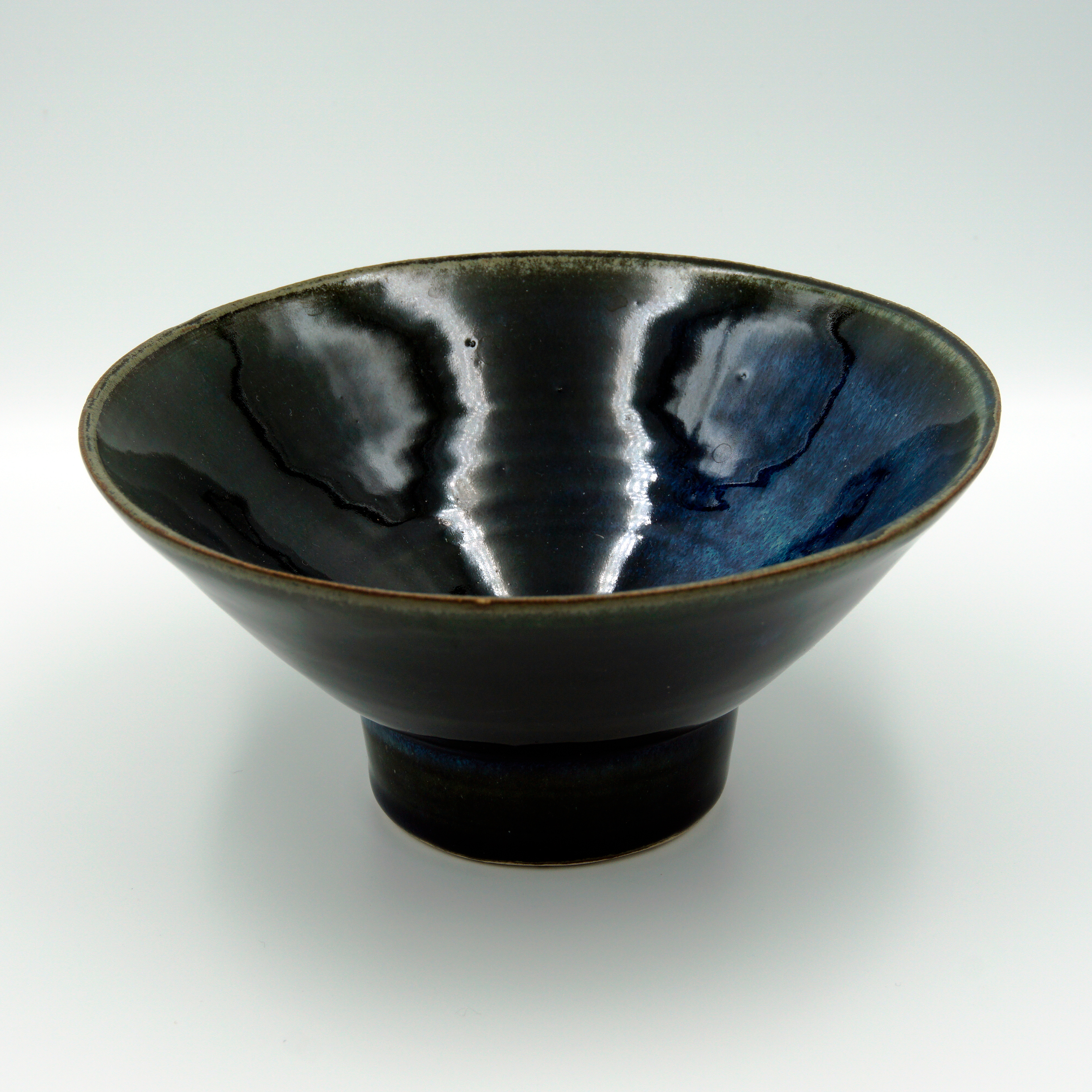 Japanese-style bowl in blue-green glossy glaze