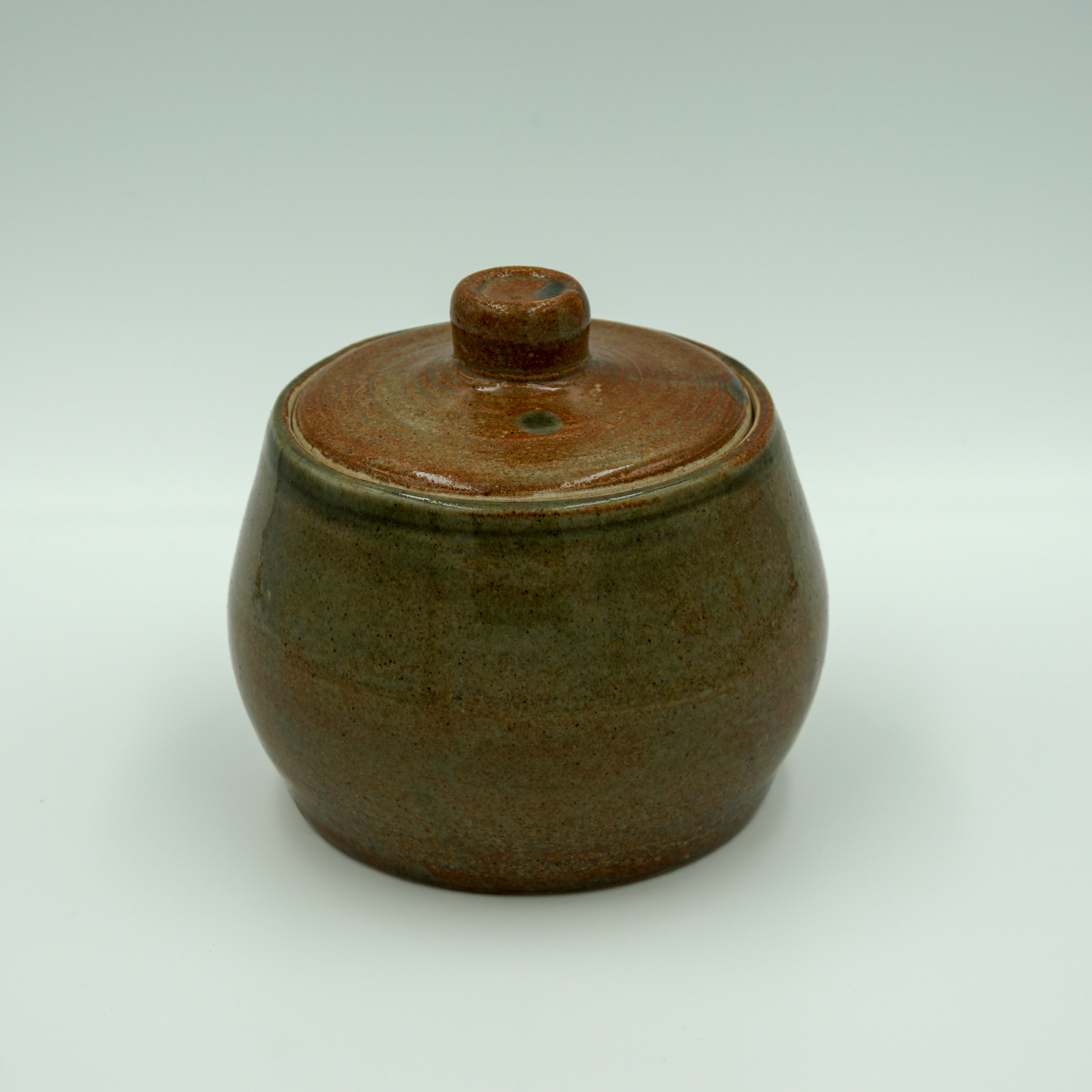 Lidded pot in 'Garden green' glaze