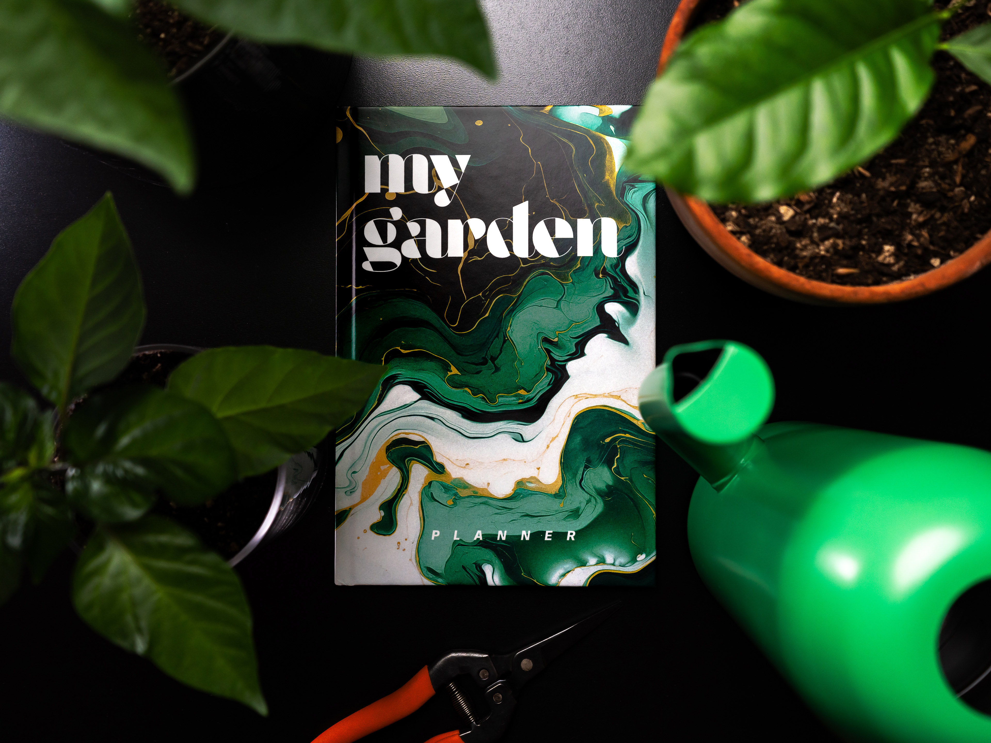 Hardcover front of My Garden planner by Nomad Crayon designed for plant cultivation