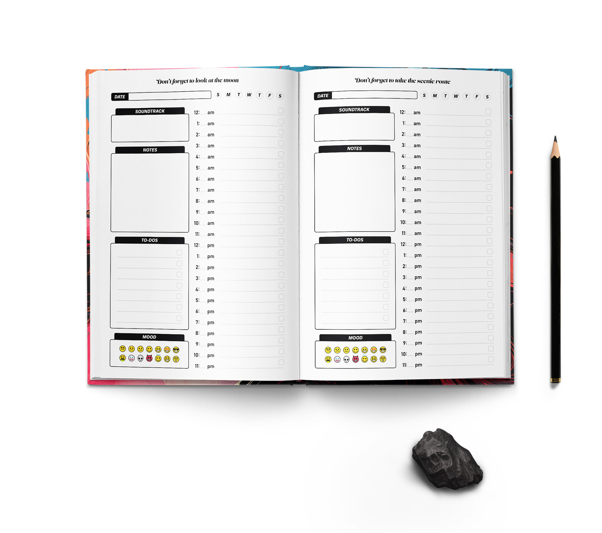 Inside pages of Nomad Crayon's hardcover planne with twenty-four hour day organization sheets