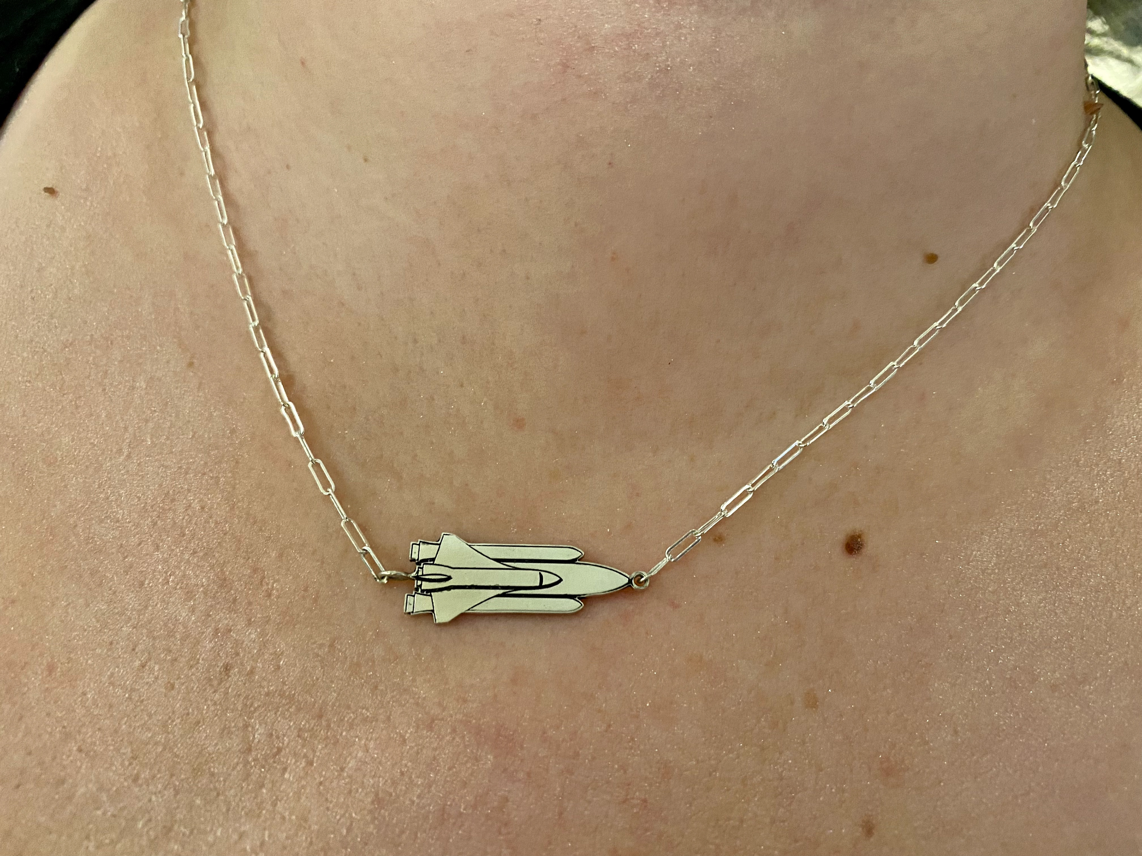 Sterling Silver Space Shuttle necklace. Preorders launch soon! Email john@thespaceshot.com to stay up to date on when this project launches in 2022.