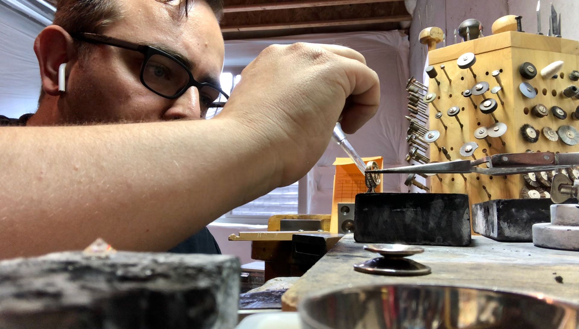 Preparing to solder a ring.