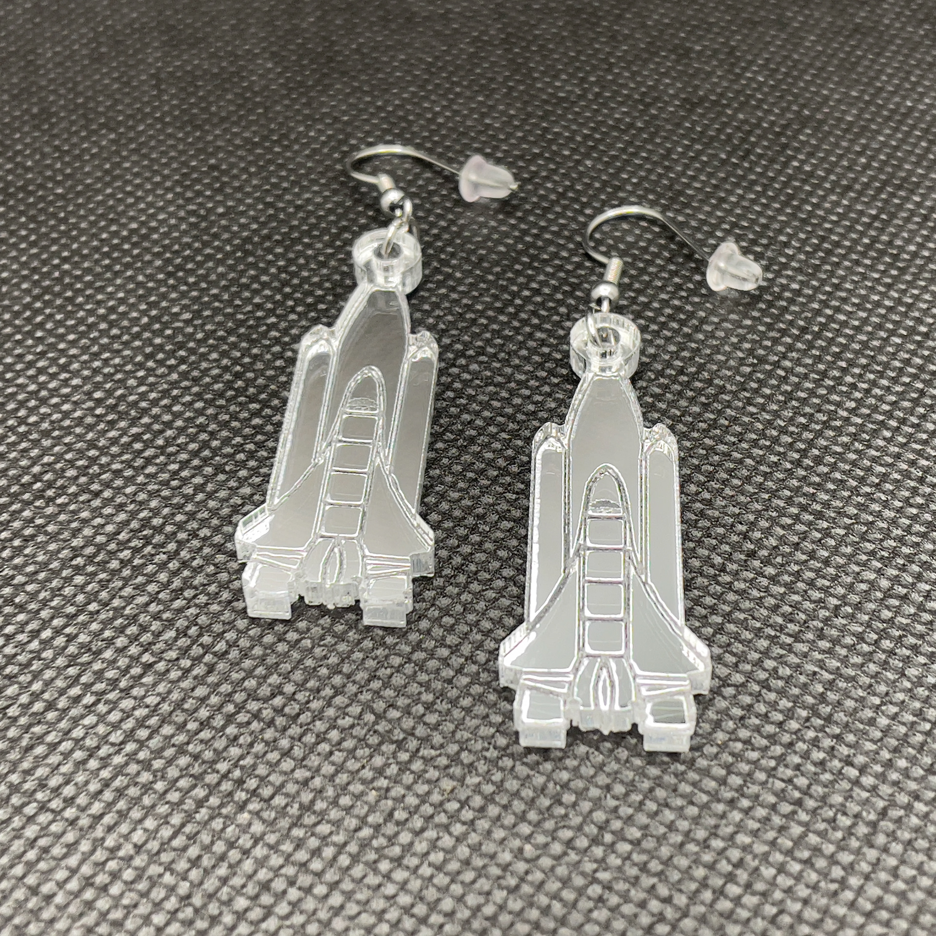 Space Shuttle acrylic earrings.