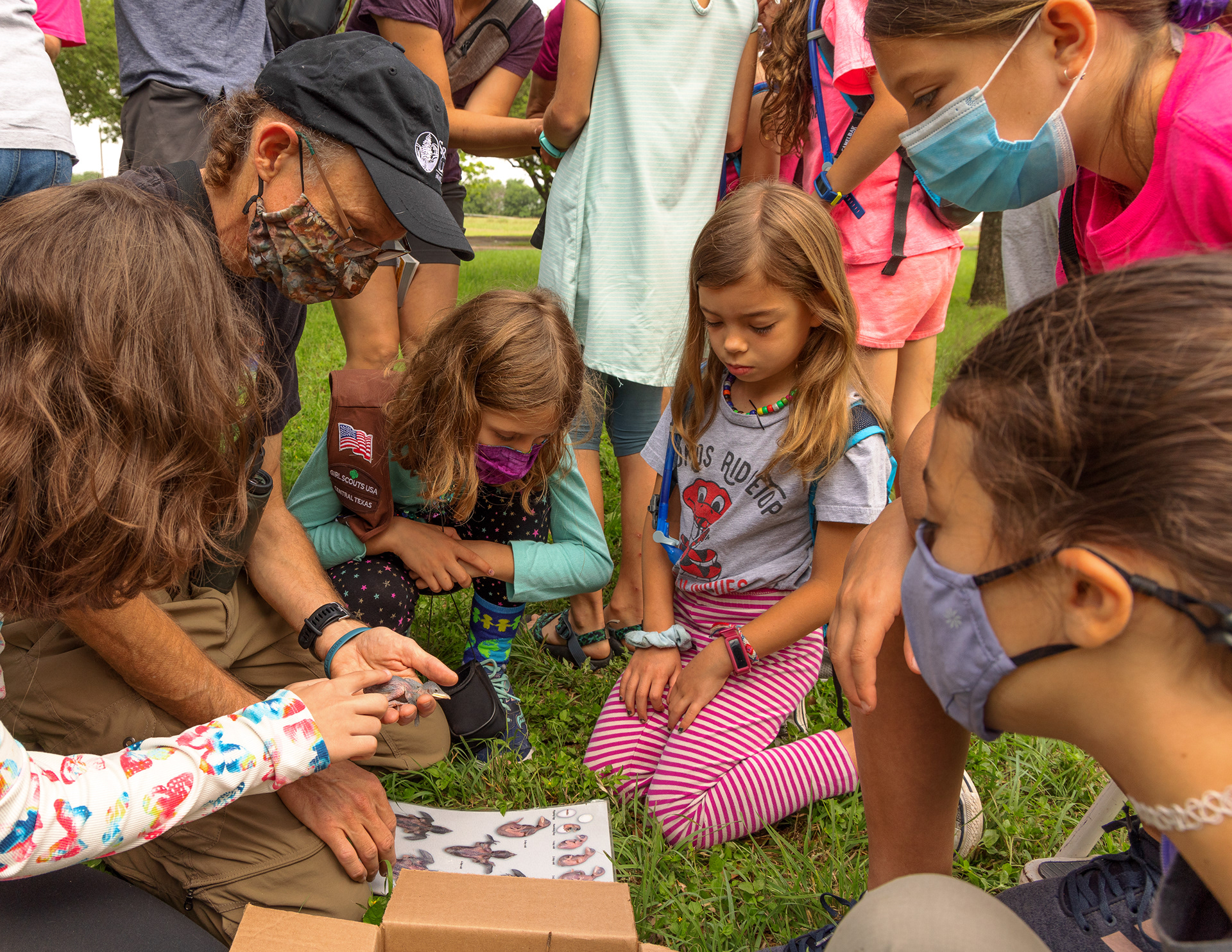 Andy & Julia Balinsky host a girl scout troop at their purple martin colony at Hornsby Bend Environmental Center. The girls learn about the birds’ nesting habits and get a close-up look at the nestlings. Hornsby Bend, Austin, TX.