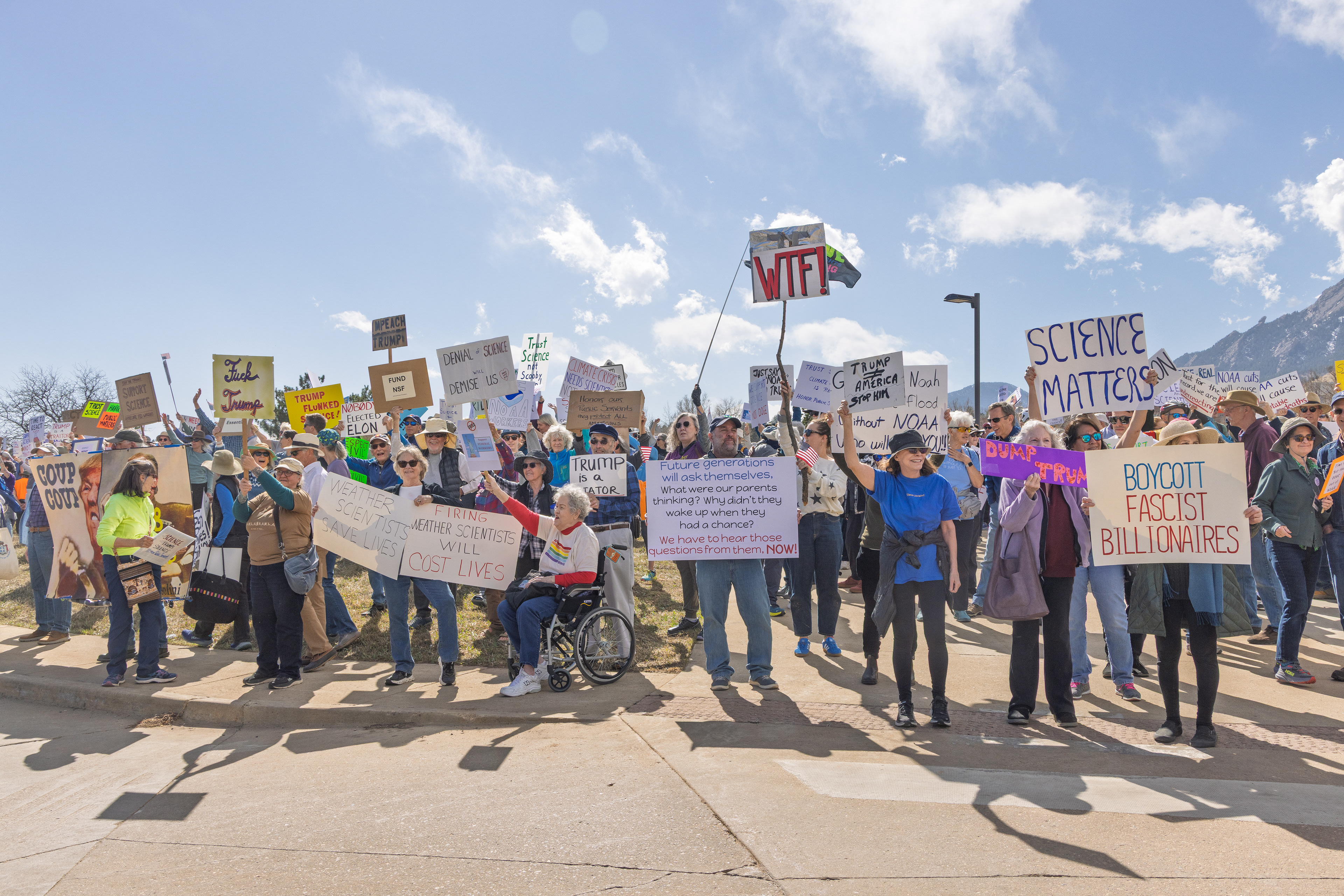 Protestors in Boulder, Colorado rally against employee firings at NOAA.