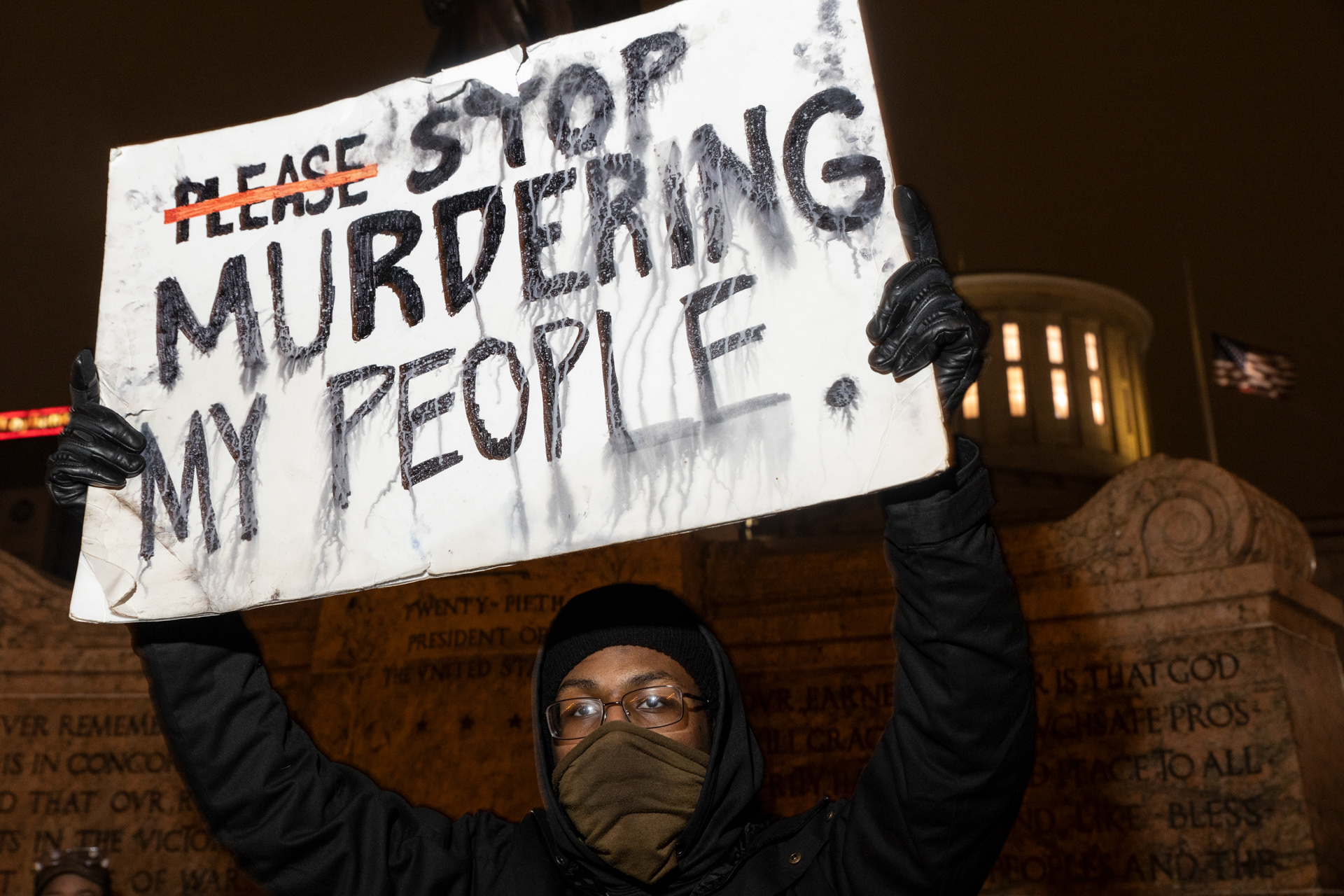 Black Lives Matter activist holds a sign against police brutality in front of the Ohio Statehouse in reaction to the shooting of Ma’Khia Bryant on April 20, 2021 in Columbus, Ohio. Columbus Police Shot and killed Ma’Khia Bryant, 16 years old, on April 20, 2021 sparking outrage from the community.