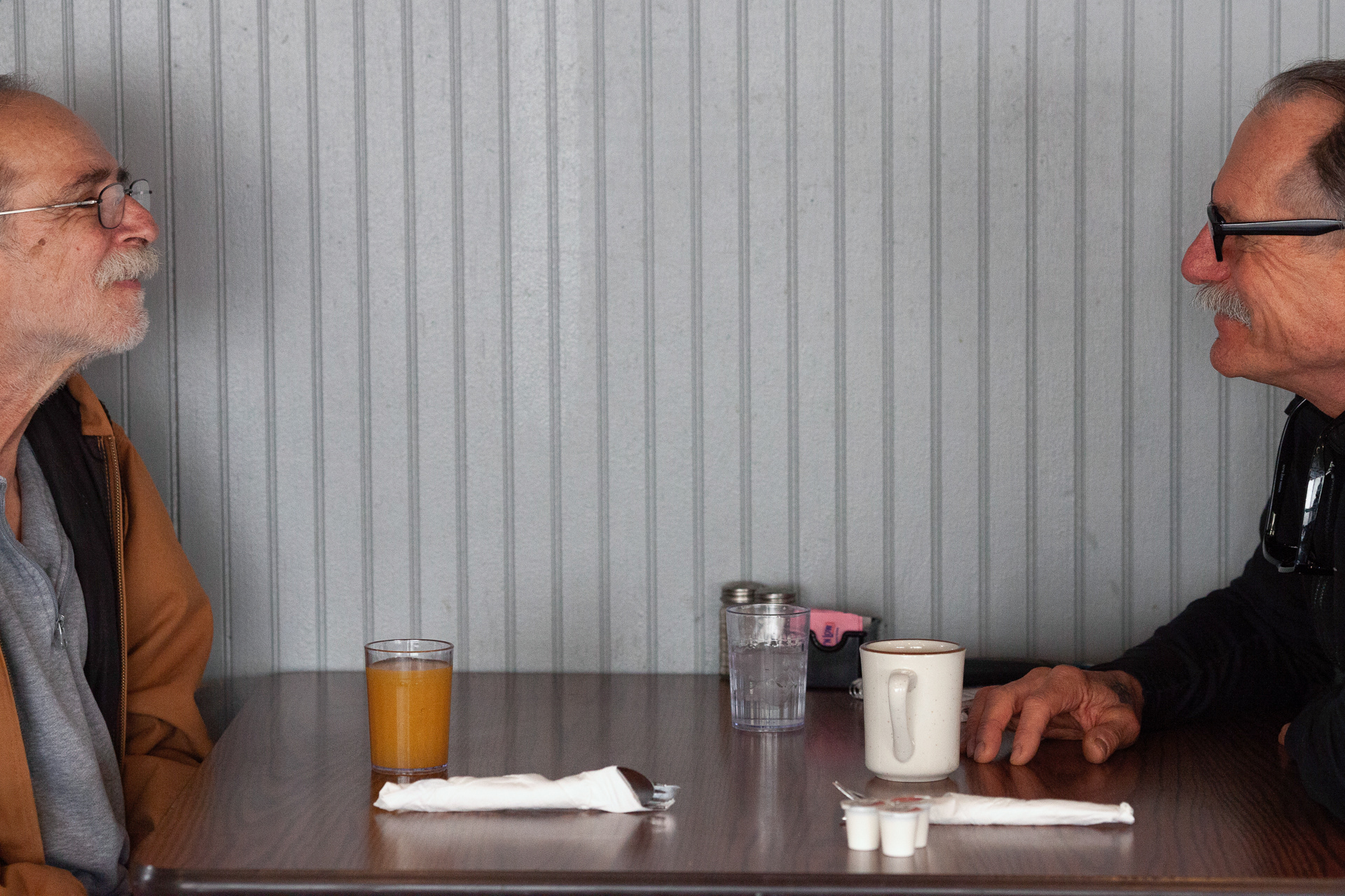 James kearnes, 58, of Albany, Ohio sits down to have breakfast with Robert Lockheed, 64, of Athens, ohio at Ray's Harvest House in Albany, Ohio, Apr. 2, 2019. Kearnes has lived in Albany for 25 years, and has made the Harvest House part of his routine.