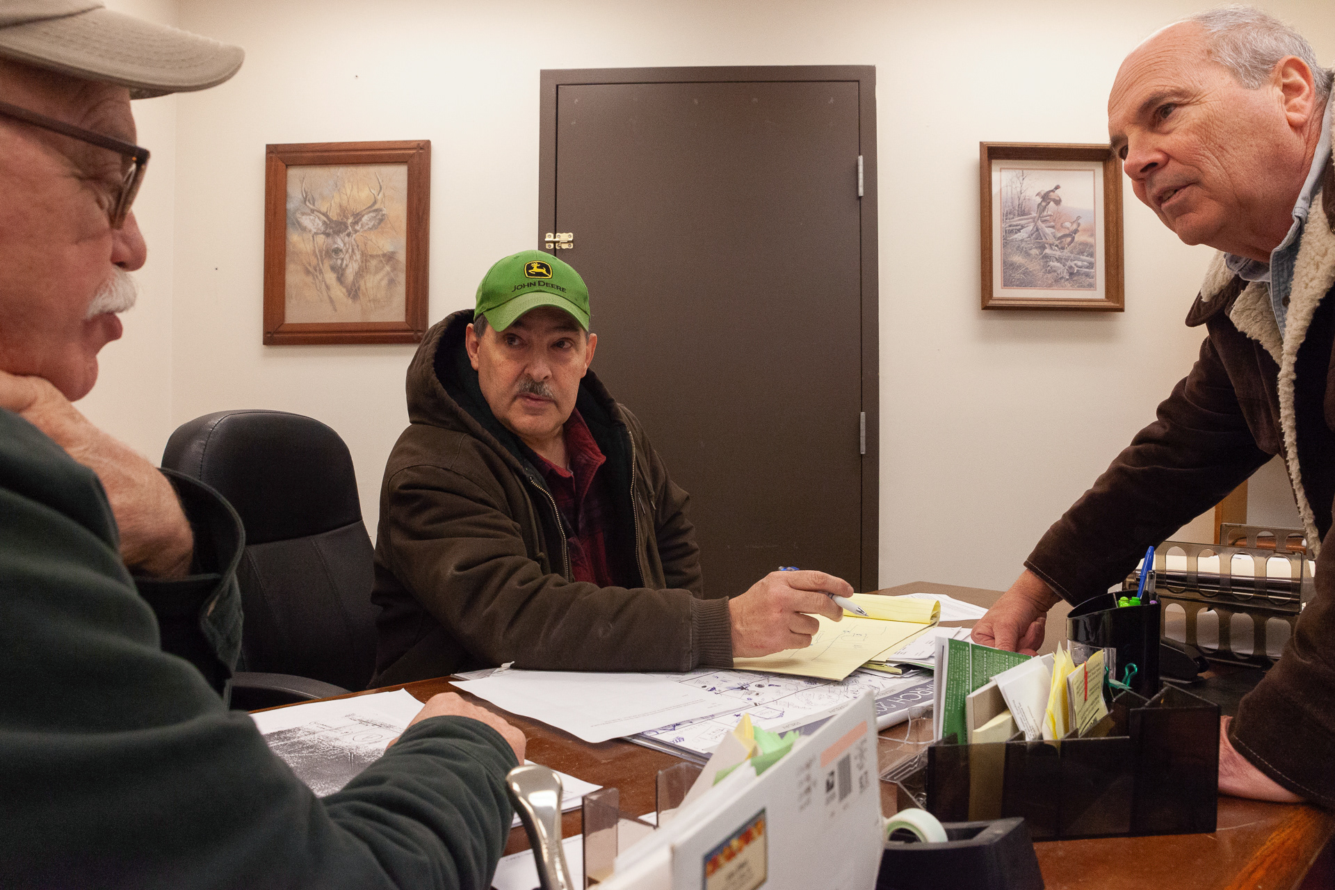 Mayor Tim Kirkendal (center) of Albany, Ohio meets with Neal Reynolds (left), the President of the Albany Village Council, of Albany, Ohio, and Larry Payne (right), a former mayor of the Village of Albany, of Albany, Ohio, in Kirkendal's office to discuss plans to expand Albany's water facilities and piping, Feb. 21, 2019. Albany, Ohio's infrastructure is valuable to the surrounding townships, especially Alexander, because they are actually customers of the Village of Albany's water facilities.