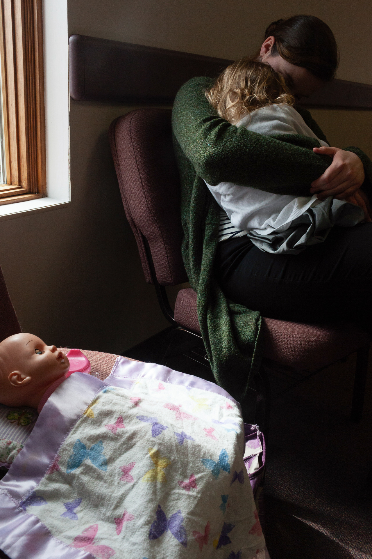 Emily Sementilli, 18, of Albany, Ohio holds her foster sister inside Albany Baptist Church during a Wedding Shower, Albany, Ohio, Mar 17, 2019. Albany Baptist Church is home to multiple different foster families.