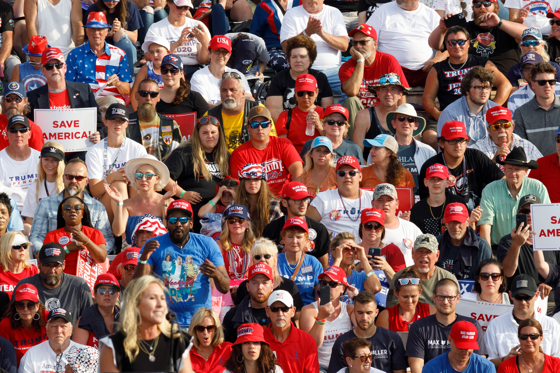 Trump supporters cheer in stands for Georgia Representative Marjorie Taylor Greene during a Trump rally in Wellington, Ohio on June 26, 2021. Greene, an open QAnon supporter, upheld Trump as a wonderful president, and garnered continued support for Trump and his base.