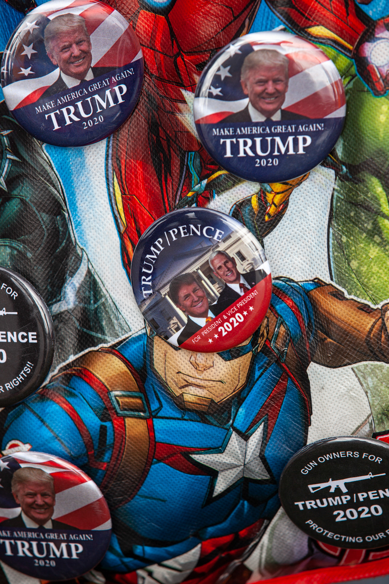 Trump and Pence supporter seen with many pro Trump/Pence buttons on his Avengers bag on Oct. 12, 2020. Vice President Mike Pence stopped in Columbus, Ohio to hold a rally at a local company Savko & Sons Inc. while on the campaign trail.