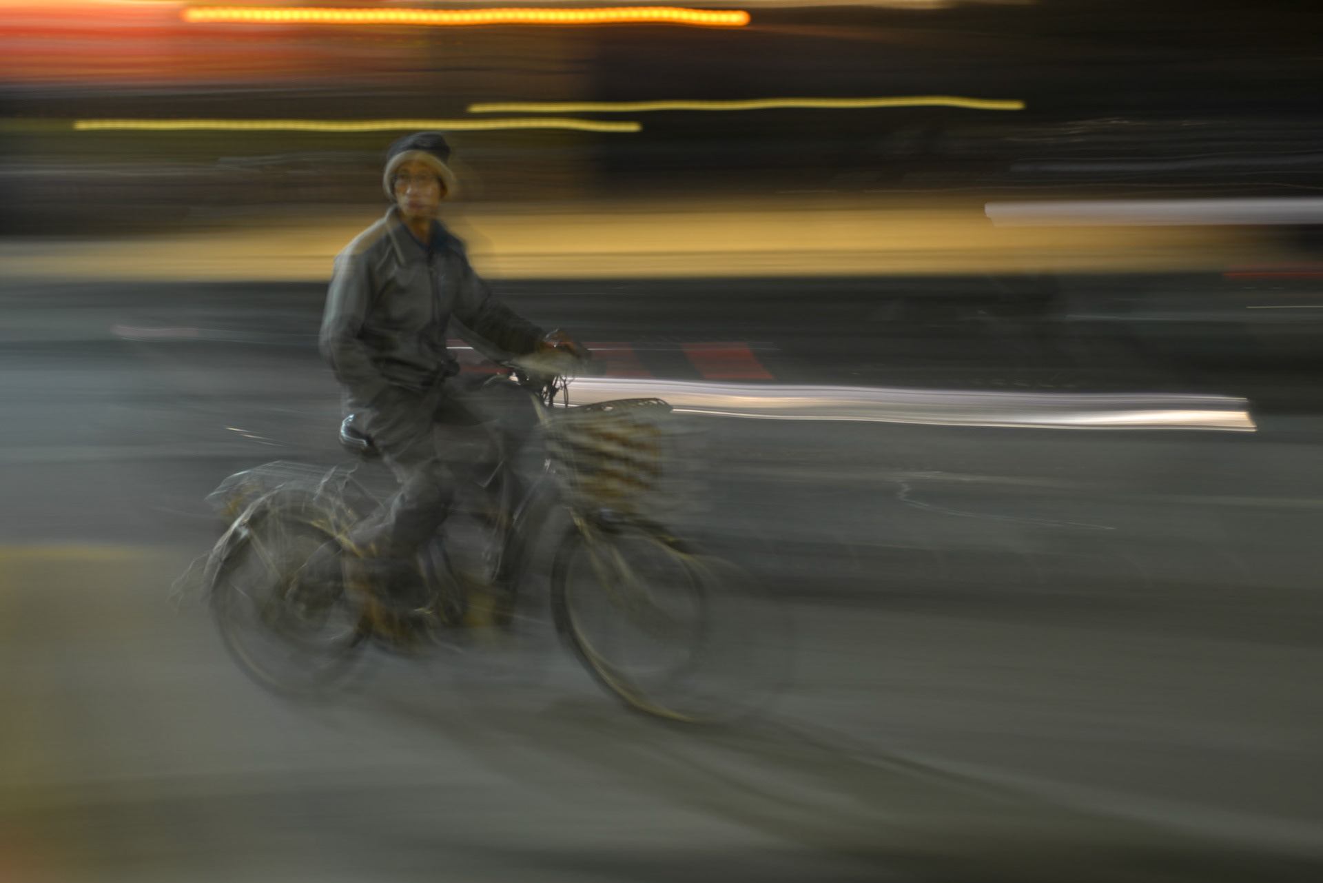 Man on bike, Hue, Vietnam