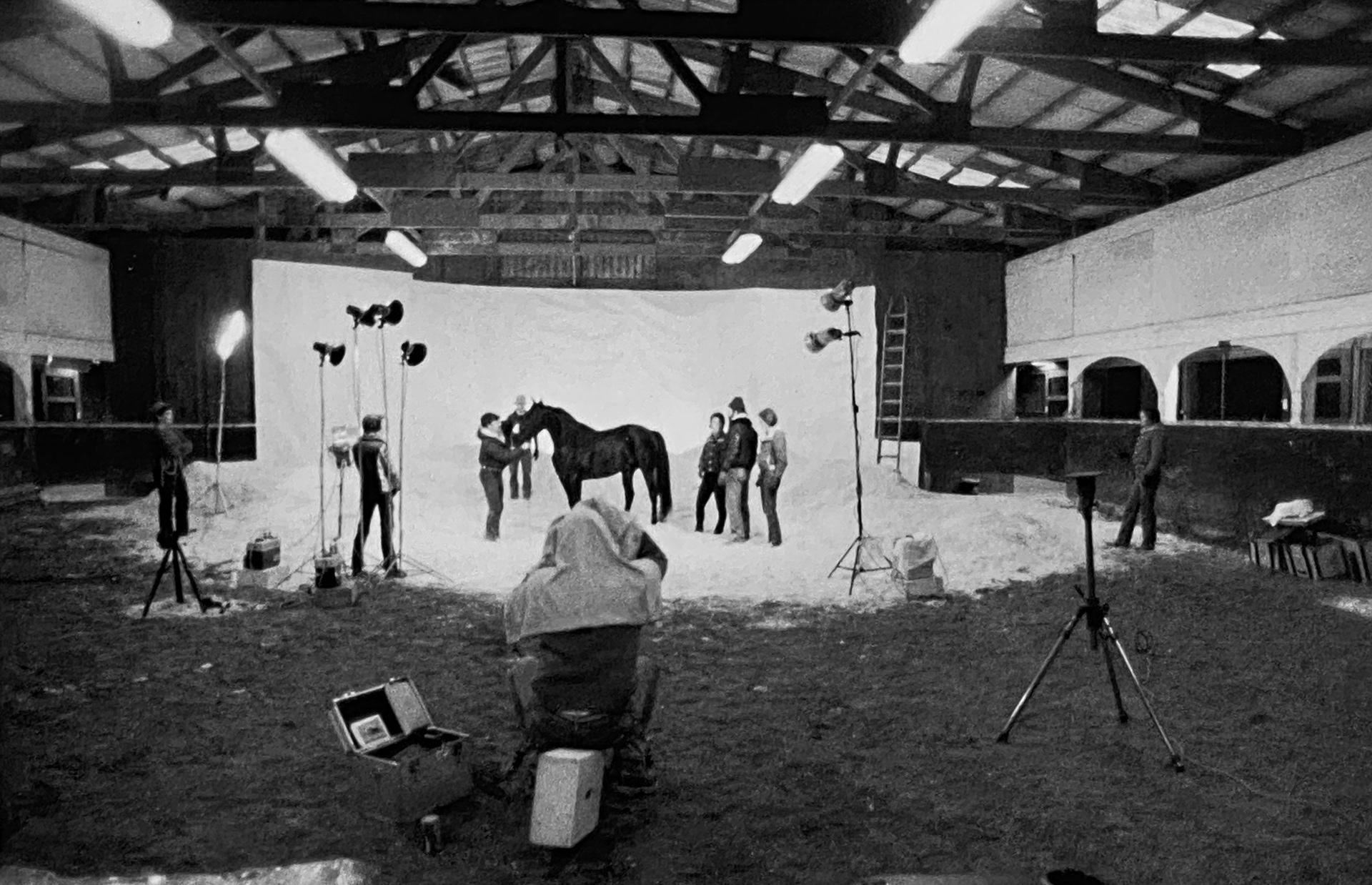 Production still giving an idea of the amount of personnel, equipment and location resources necessary for the Busch Stallion photography. Shot with a 4x5 camera.