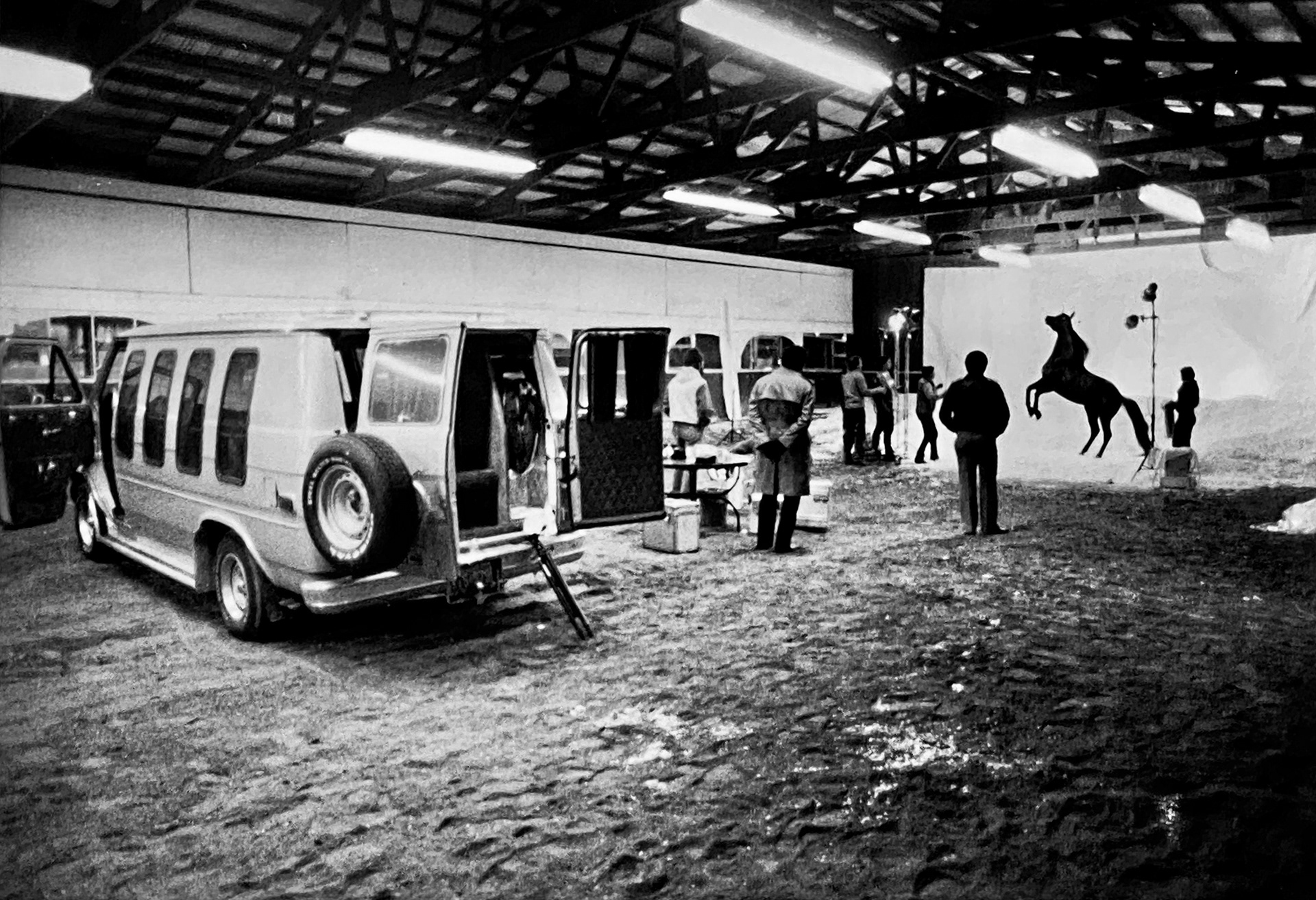 Production still giving an idea of the amount of personnel, equipment and location resources necessary for the Busch Stallion photography. Shot with a 4x5 camera.