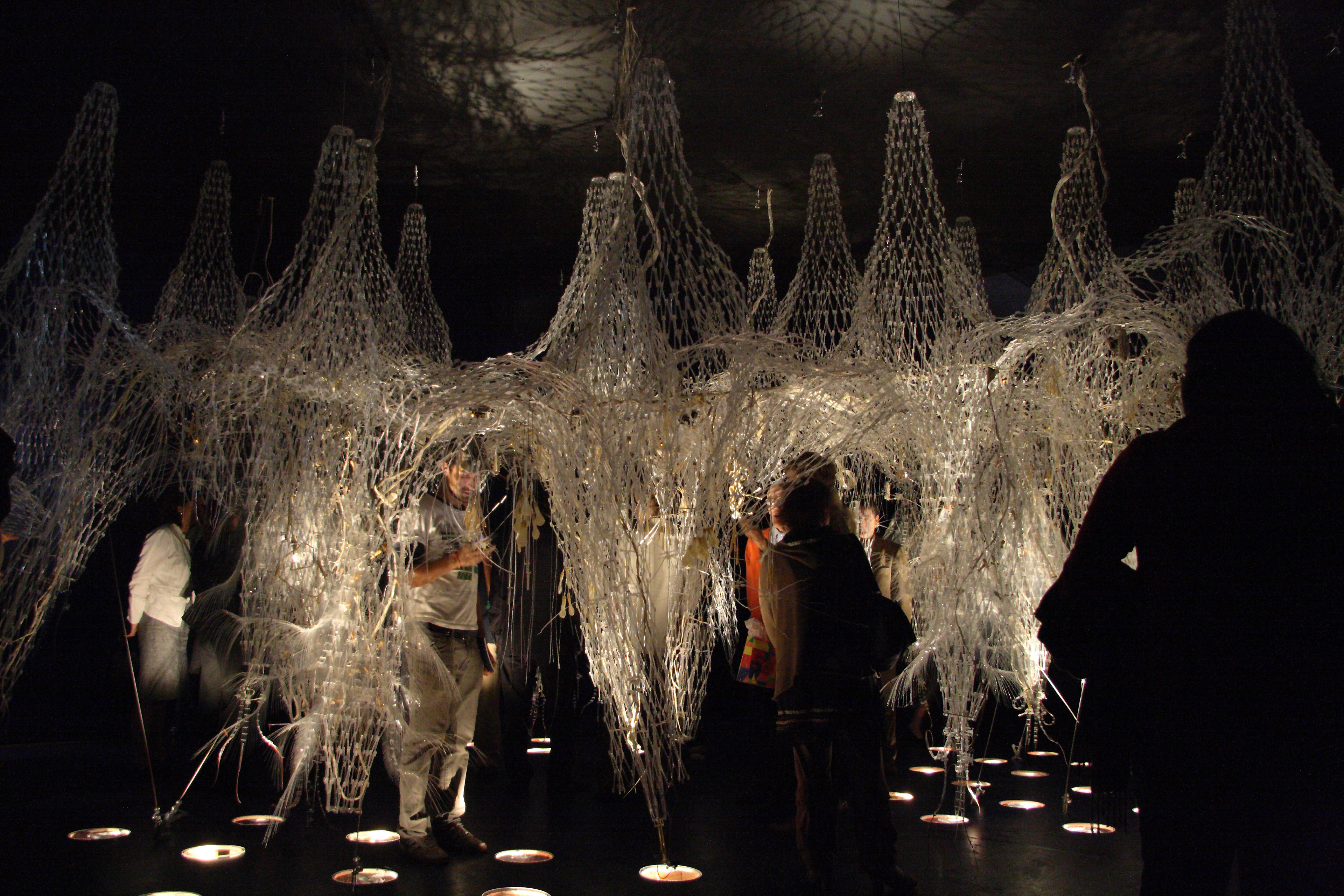 Visitors Exploring the Sculpture