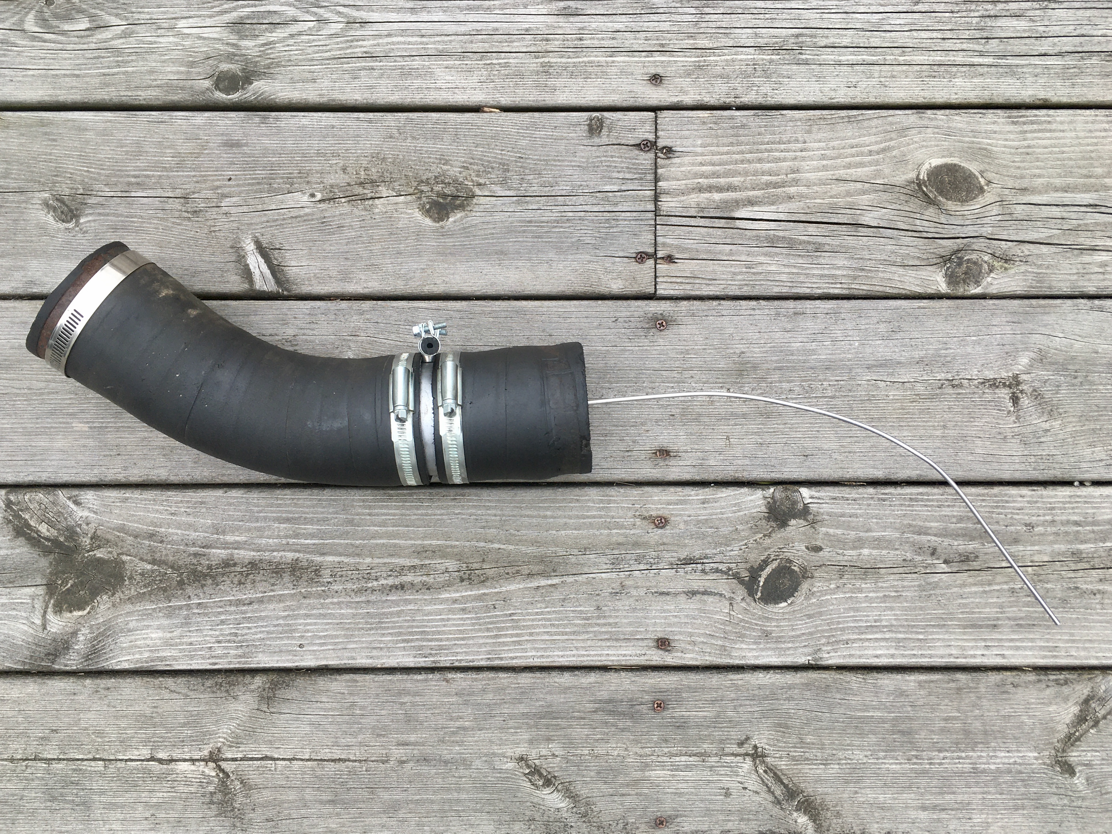 Customised filler tube with added supply to the diesel heater