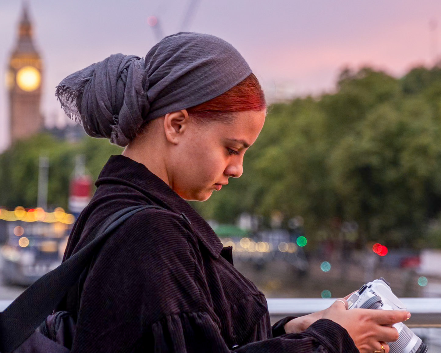 Me Holding my first DSLR (Canon 250D) after going on a photowalk with a Friend around London. 