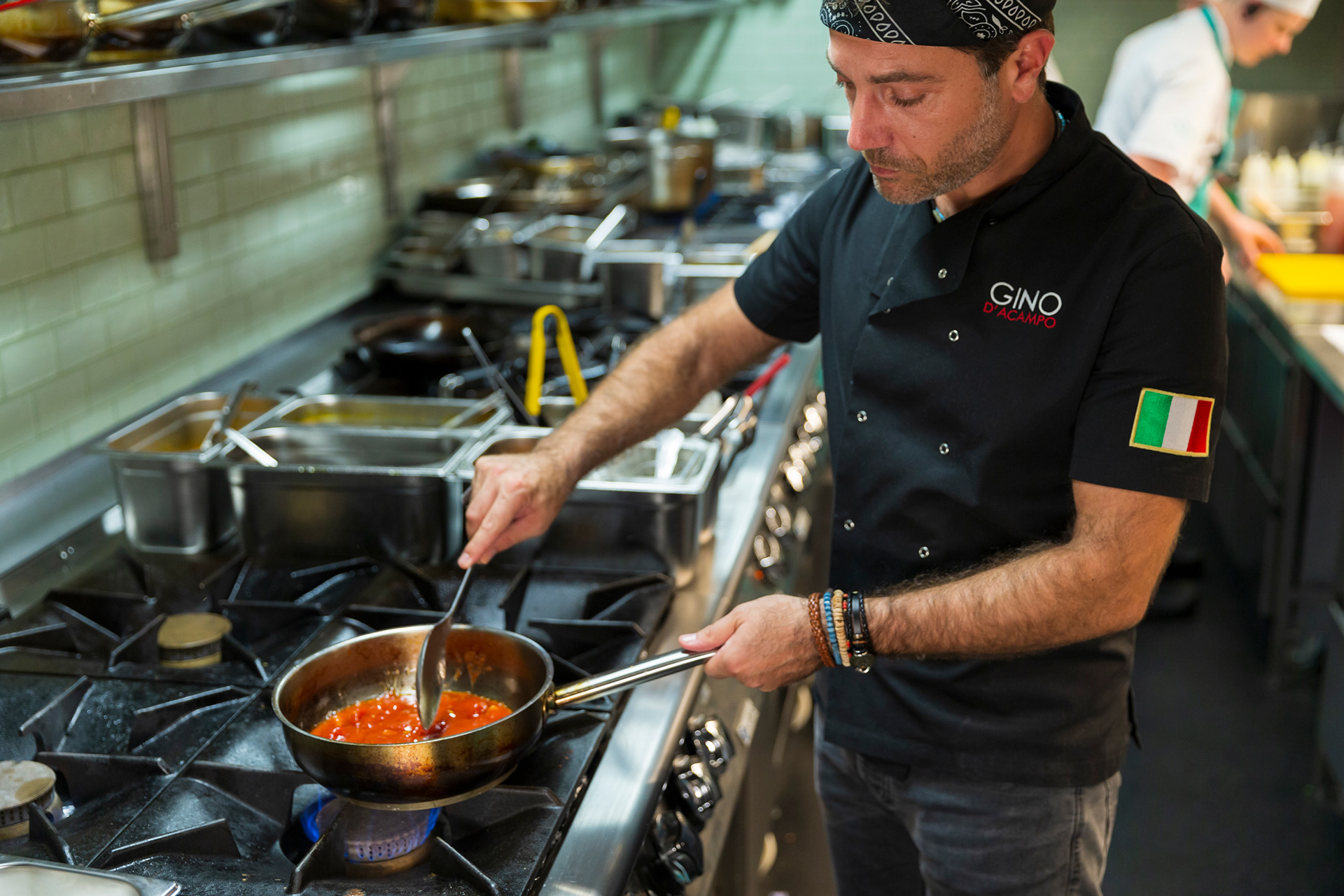 Gino showing me how to cook a favourite dish of his