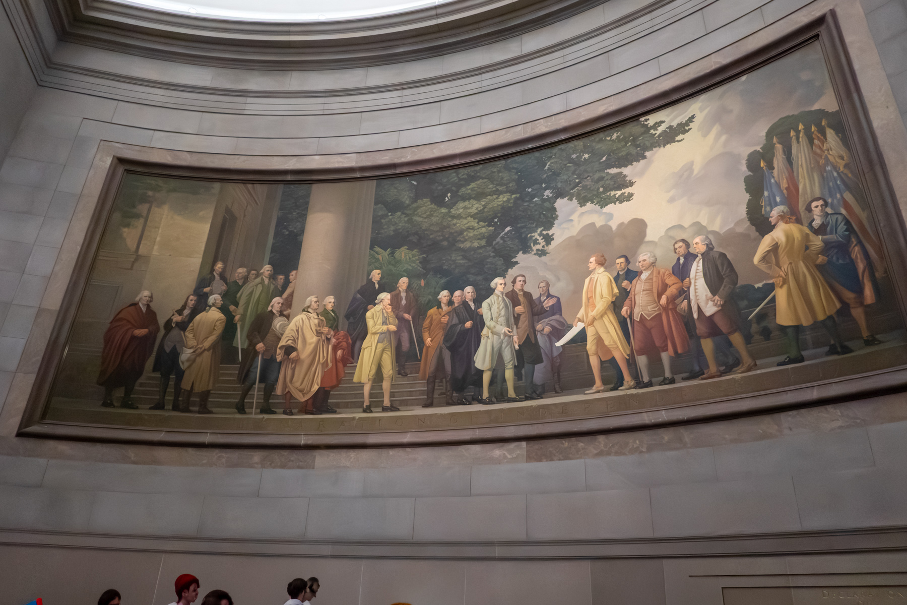 "The Declaration of Indpendence" showing John Hancock, Benjamin Harrison, Samuel Huntington, Thomas Jefferson, Roger Sherman, John Adams, Robert Livingston, and Benjamin Franklin. The profile of Abraham Lincoln can be seen in the clouds 