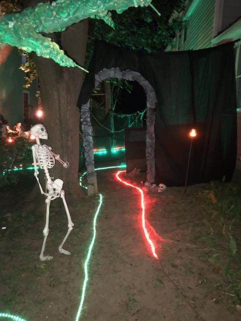 Lights guide trick-or-treaters past the horrors on the Haunted Path