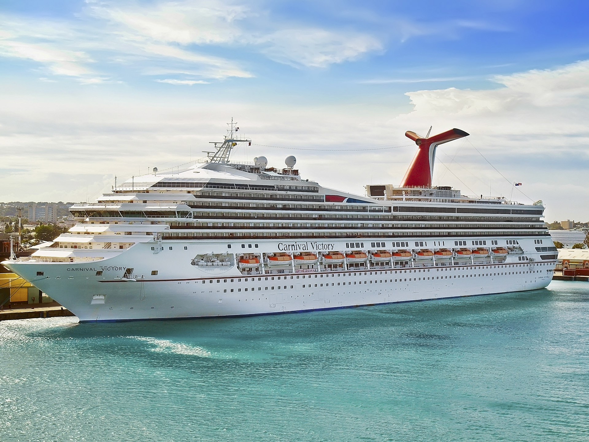 BRIDGETOWN, BARBADOS - APRIL 11,2012:  Cruise ship Carnival Victory, docked at Bridgetown on the Caribbean island  Barbados on a sunny day.