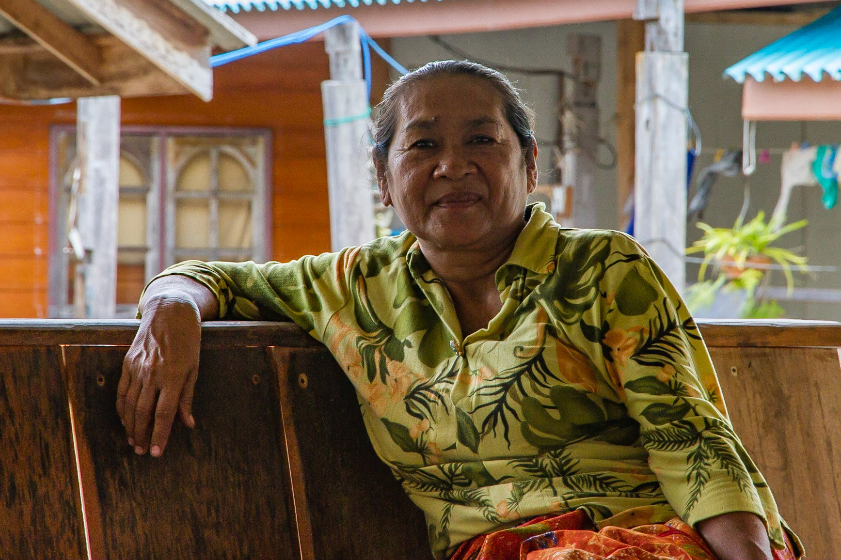 old lady near a pier that we could take a picture from