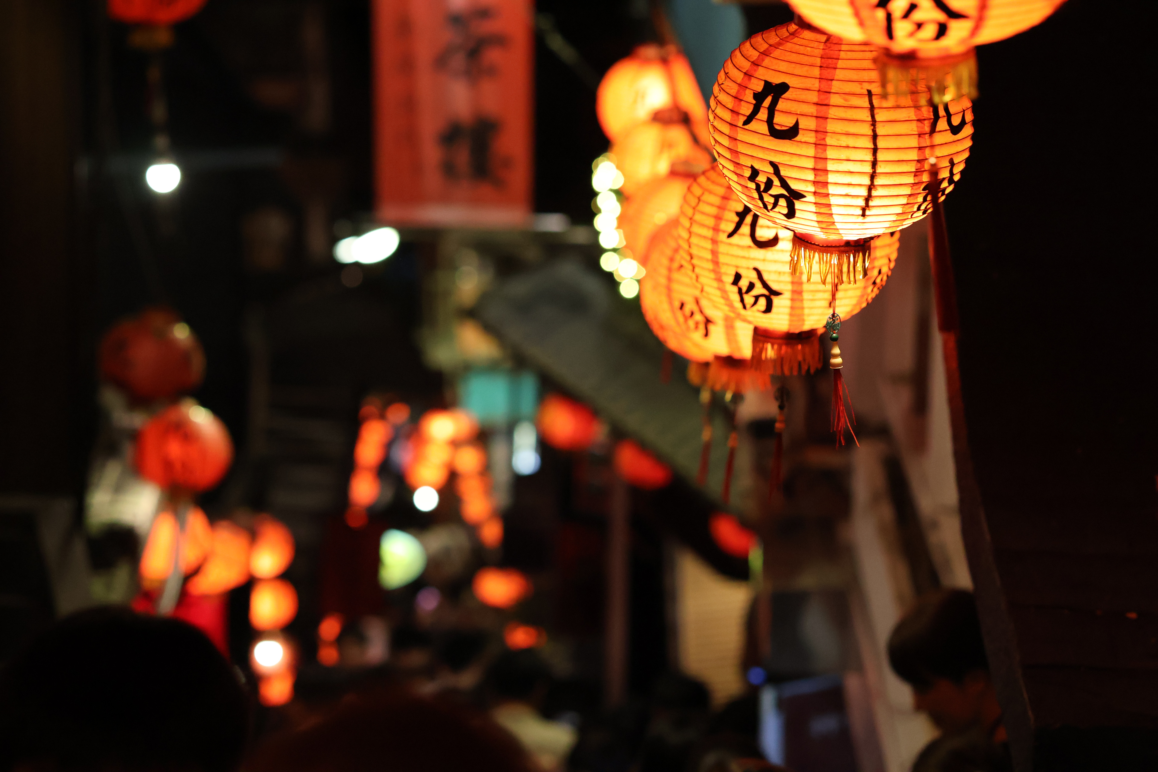 Lanterns hang along a busy street in Jiufen, Taiwan.
